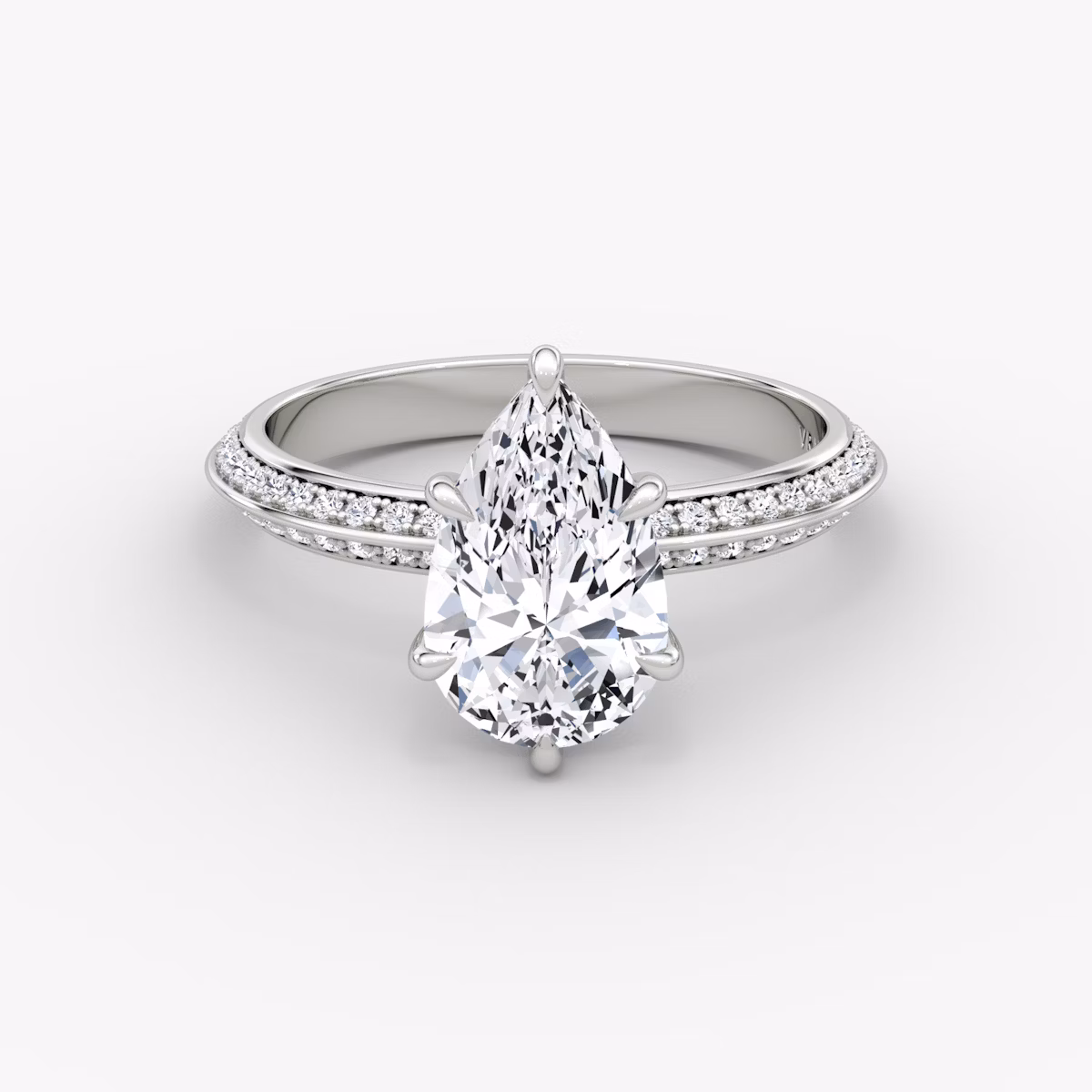 The Knife-Edge | Pear | Platinum | bandAccent: Pavé | hiddenHalo: yes | diamondOrientation: vertical | caratWeight: other