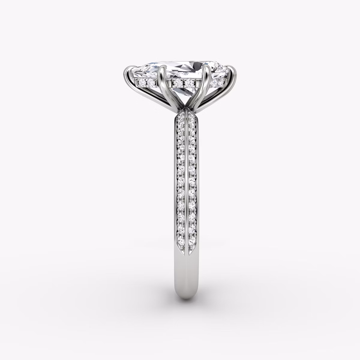 The Knife-Edge | Pear | Platinum | bandAccent: Pavé | hiddenHalo: yes | diamondOrientation: vertical | caratWeight: other