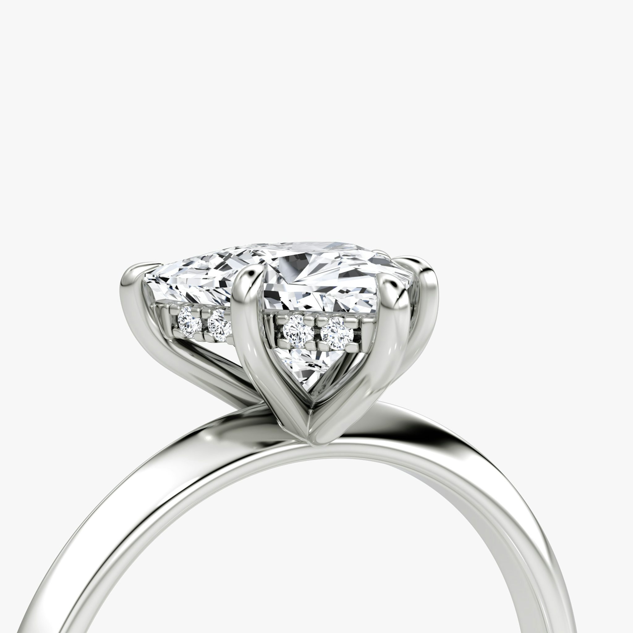 The Knife-Edge | Trillion | 18k | White Gold | bandAccent: Plain | hiddenHalo: yes | diamondOrientation: vertical | caratWeight: other