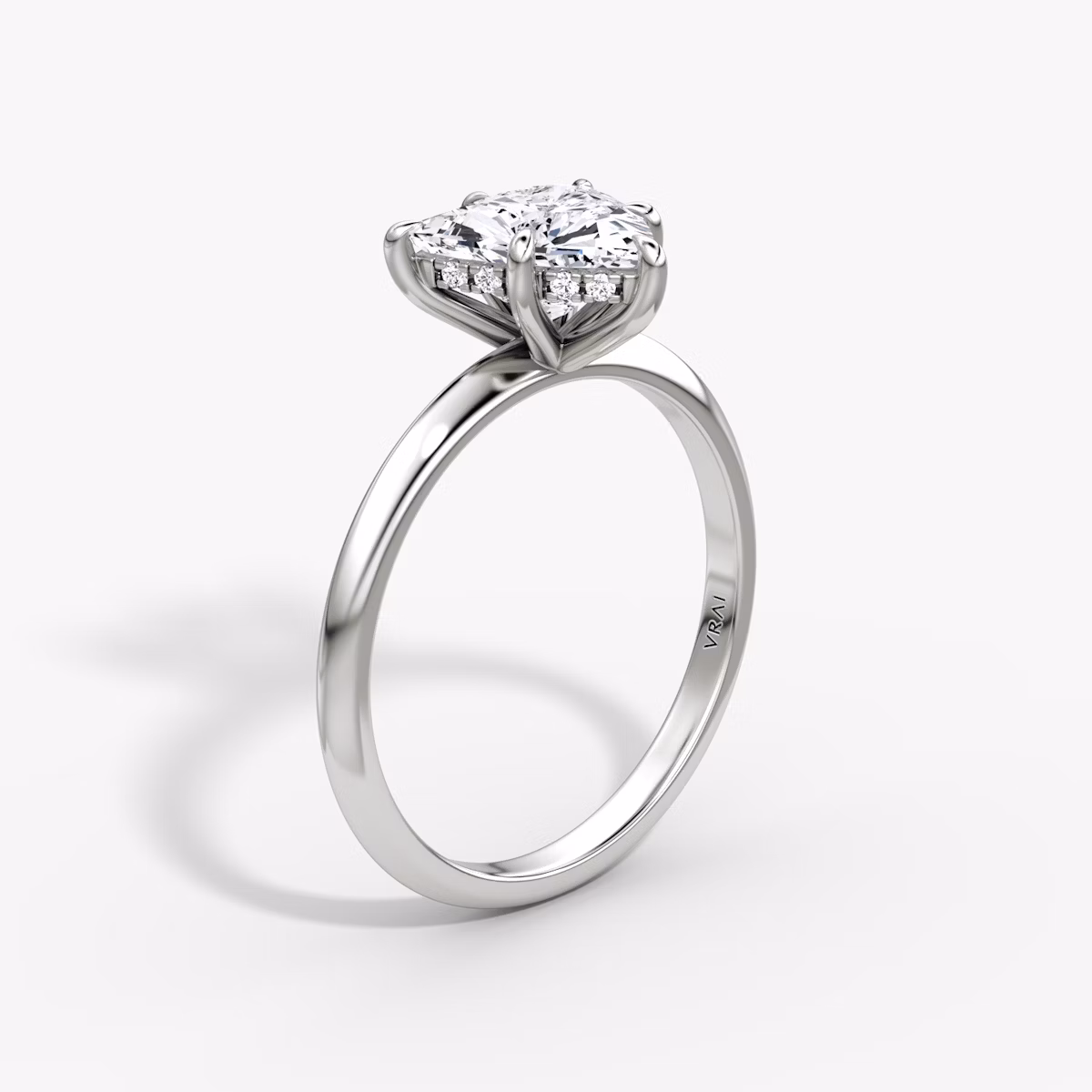 Anillo de compromiso Knife-Edge | Trillón | 18k | Oro blanco | bandAccent: Simple | hiddenHalo: yes | diamondOrientation: vertical | caratWeight: other
