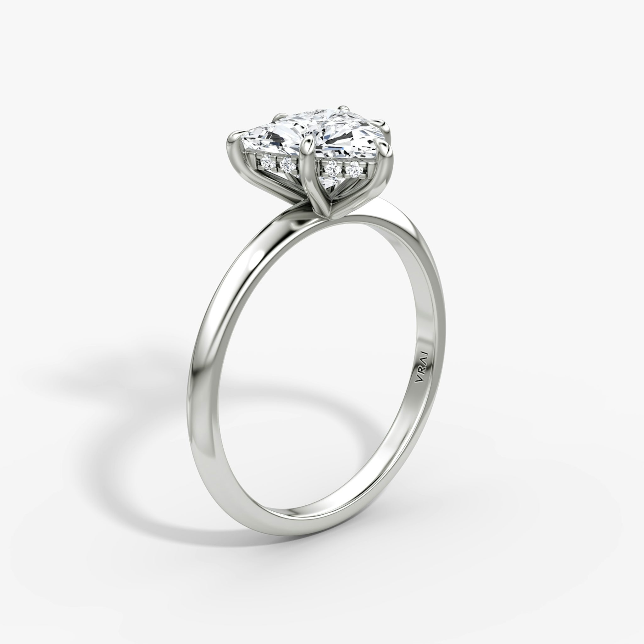 The Knife-Edge | Trillion | 18k | White Gold | bandAccent: Plain | hiddenHalo: yes | diamondOrientation: vertical | caratWeight: other