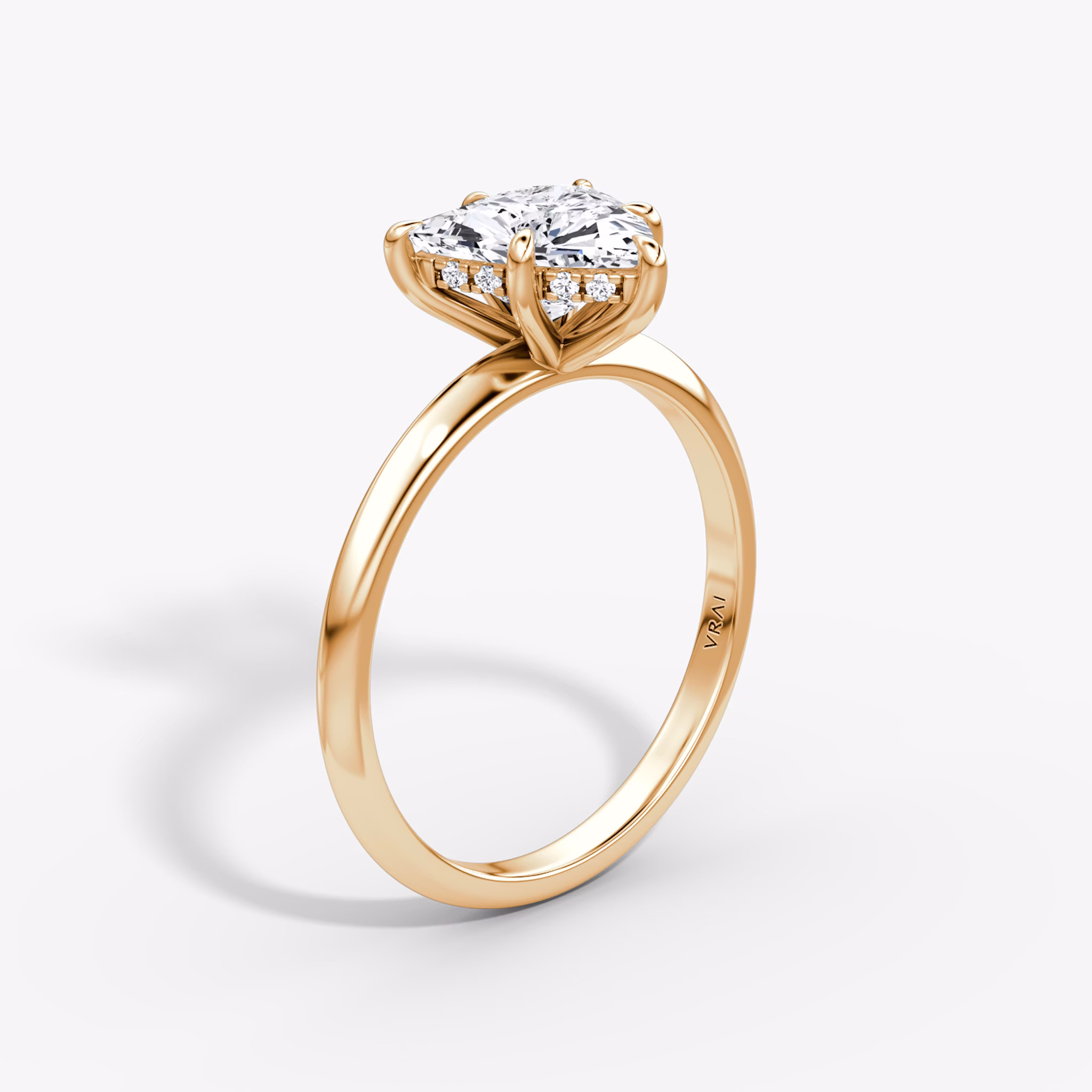 The Knife-Edge | Trillion | 14k | Rose Gold | bandAccent: Plain | hiddenHalo: yes | diamondOrientation: vertical | caratWeight: other