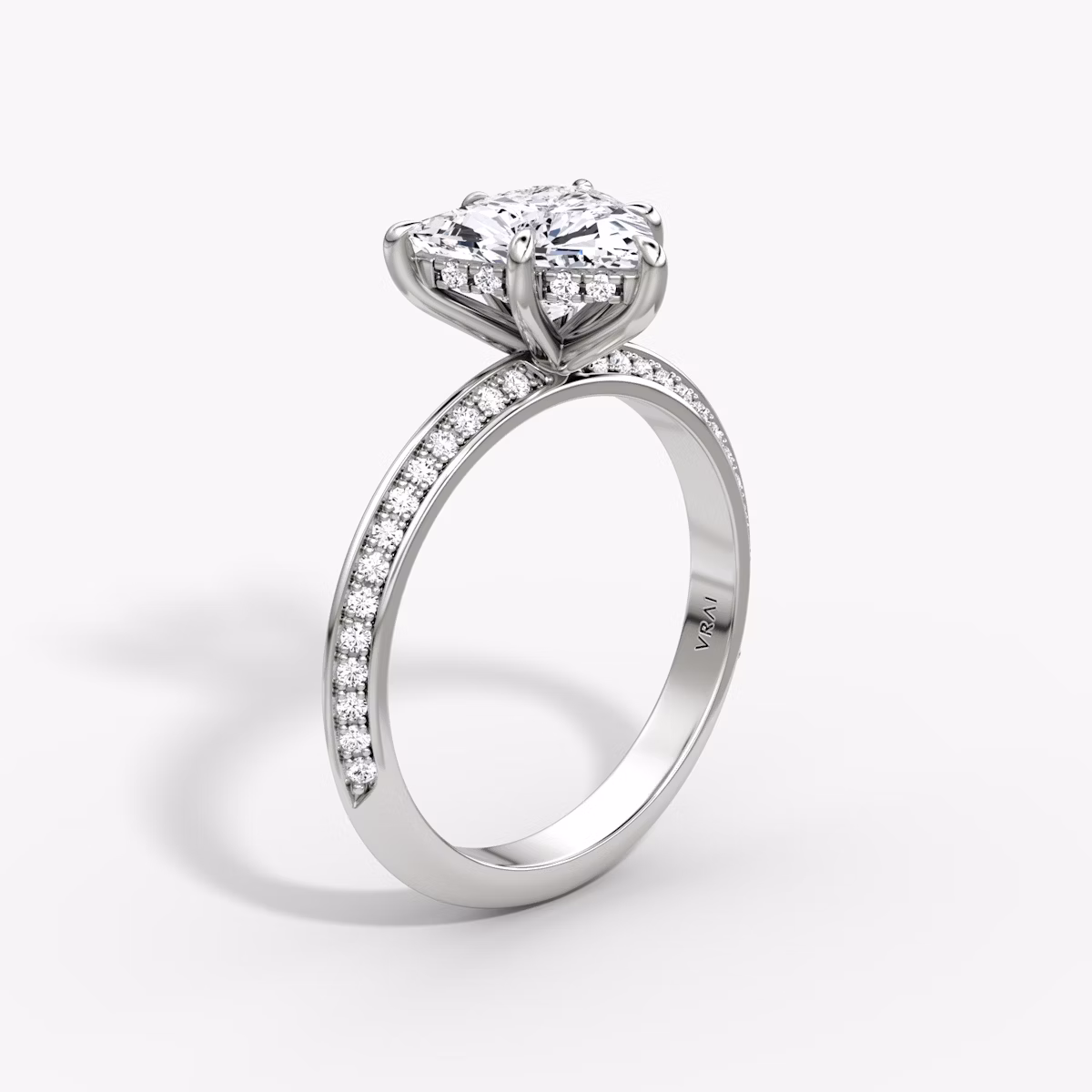 The Knife-Edge | Trillion | 18k | White Gold | bandAccent: Pavé | hiddenHalo: yes | diamondOrientation: vertical | caratWeight: other