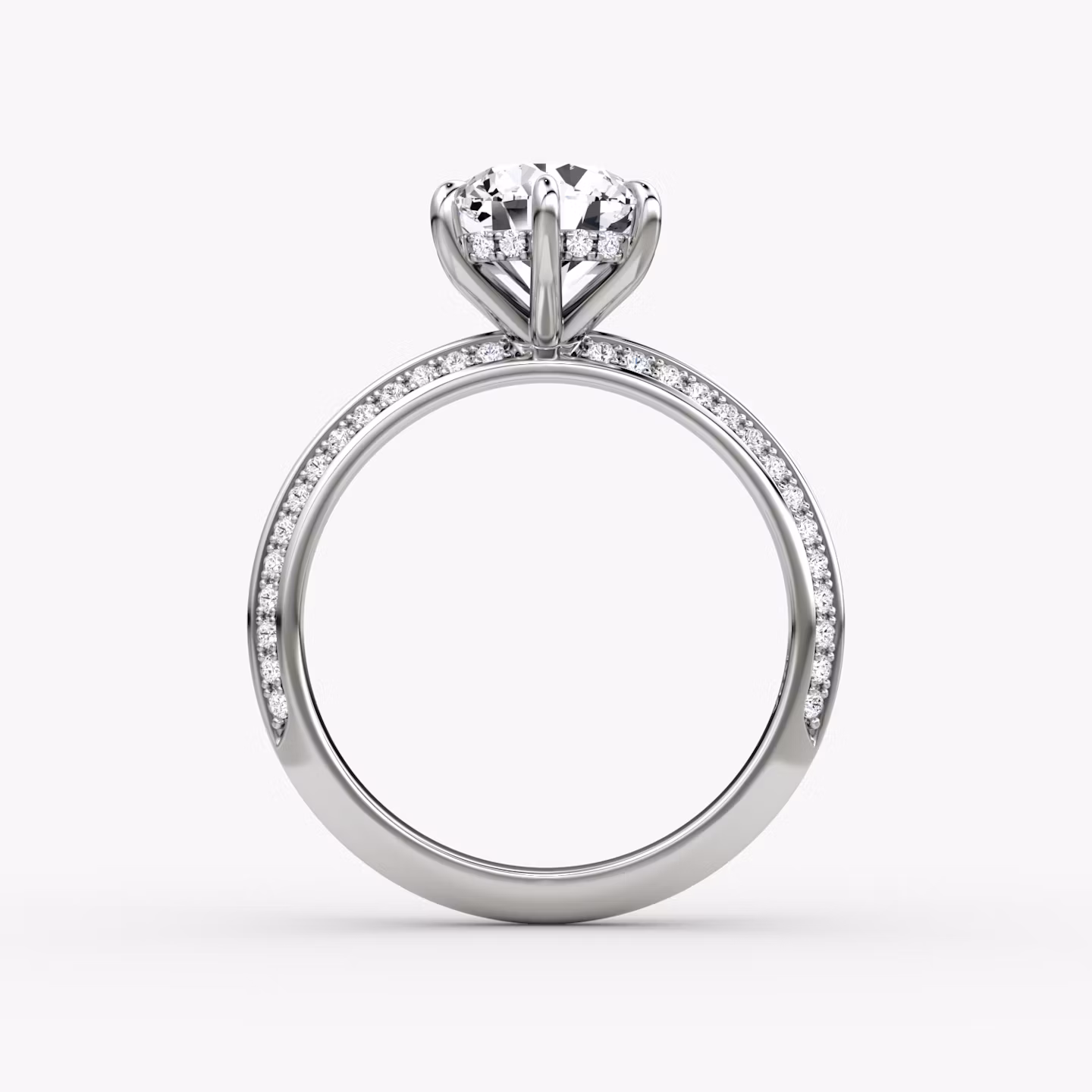 The Knife-Edge | Round Brilliant | Platinum | bandAccent: Pavé | caratWeight: 1.5ct | hiddenHalo: yes | diamondOrientation: vertical
