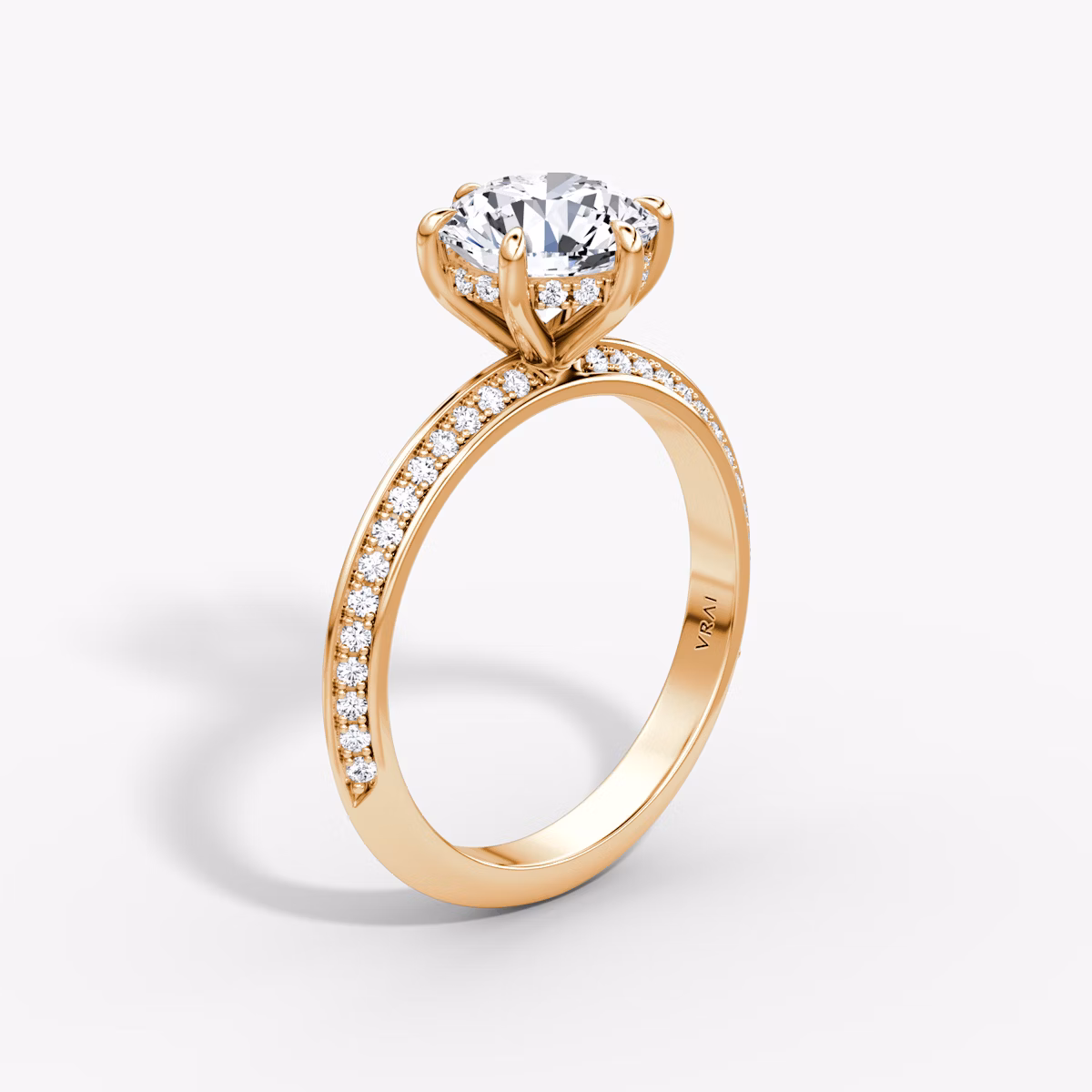 The Knife-Edge | Round Brilliant | 14k | Rose Gold | bandAccent: Pavé | caratWeight: 1.5ct | hiddenHalo: yes | diamondOrientation: vertical