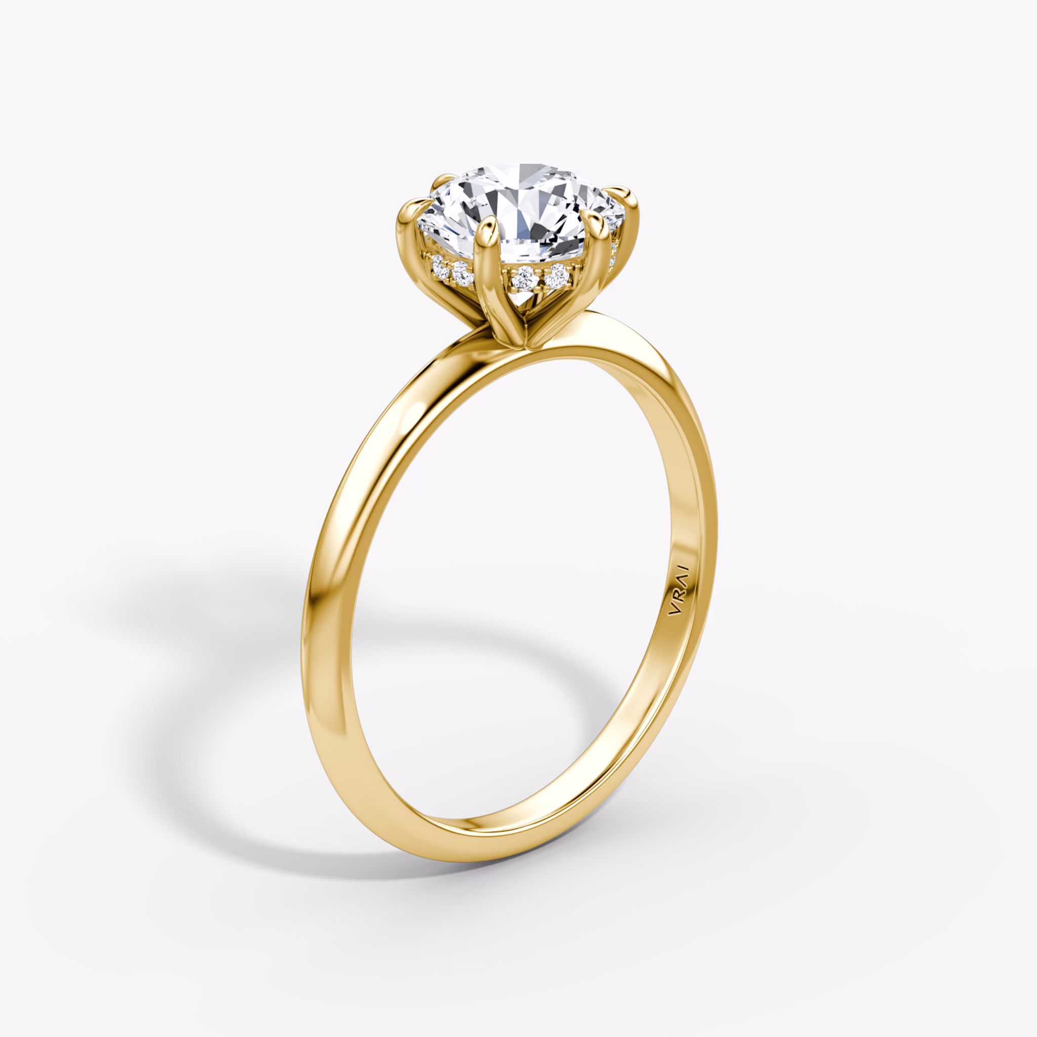 The Knife-Edge | Round Brilliant | 18k | Yellow Gold | bandAccent: Plain | caratWeight: 1.5ct | hiddenHalo: yes | diamondOrientation: vertical
