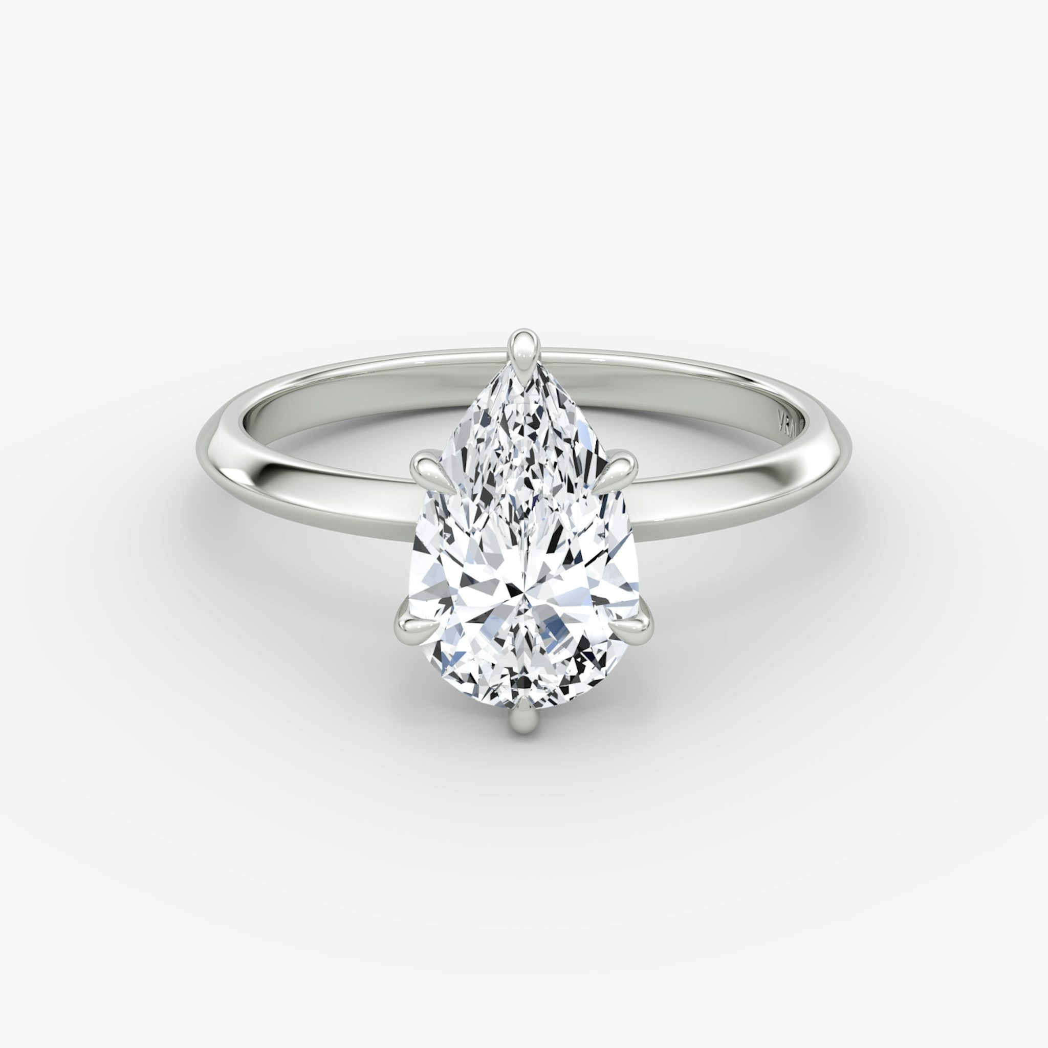 The Knife-Edge | Pear | 18k | White Gold | bandAccent: Plain | hiddenHalo: yes | diamondOrientation: vertical | caratWeight: other