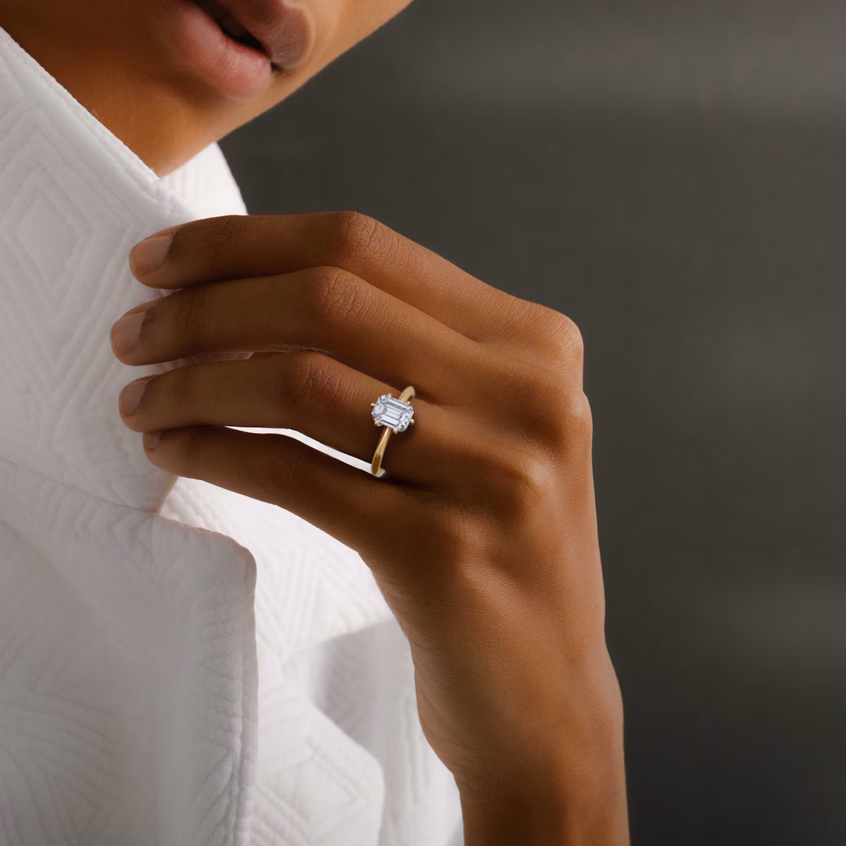 The Knife-Edge | Emerald | 14k | Rose Gold | bandAccent: Plain | hiddenHalo: yes | diamondOrientation: vertical | caratWeight: other