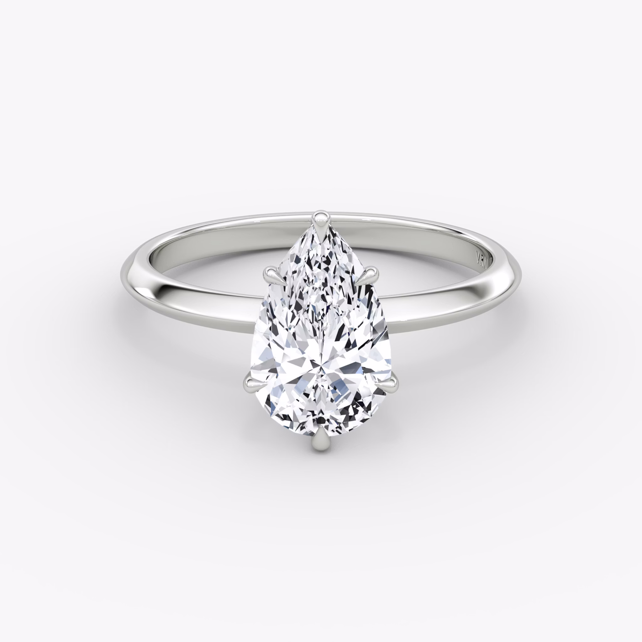 The Knife-Edge | Pear | Platinum | bandAccent: Plain | hiddenHalo: no | diamondOrientation: vertical | caratWeight: other