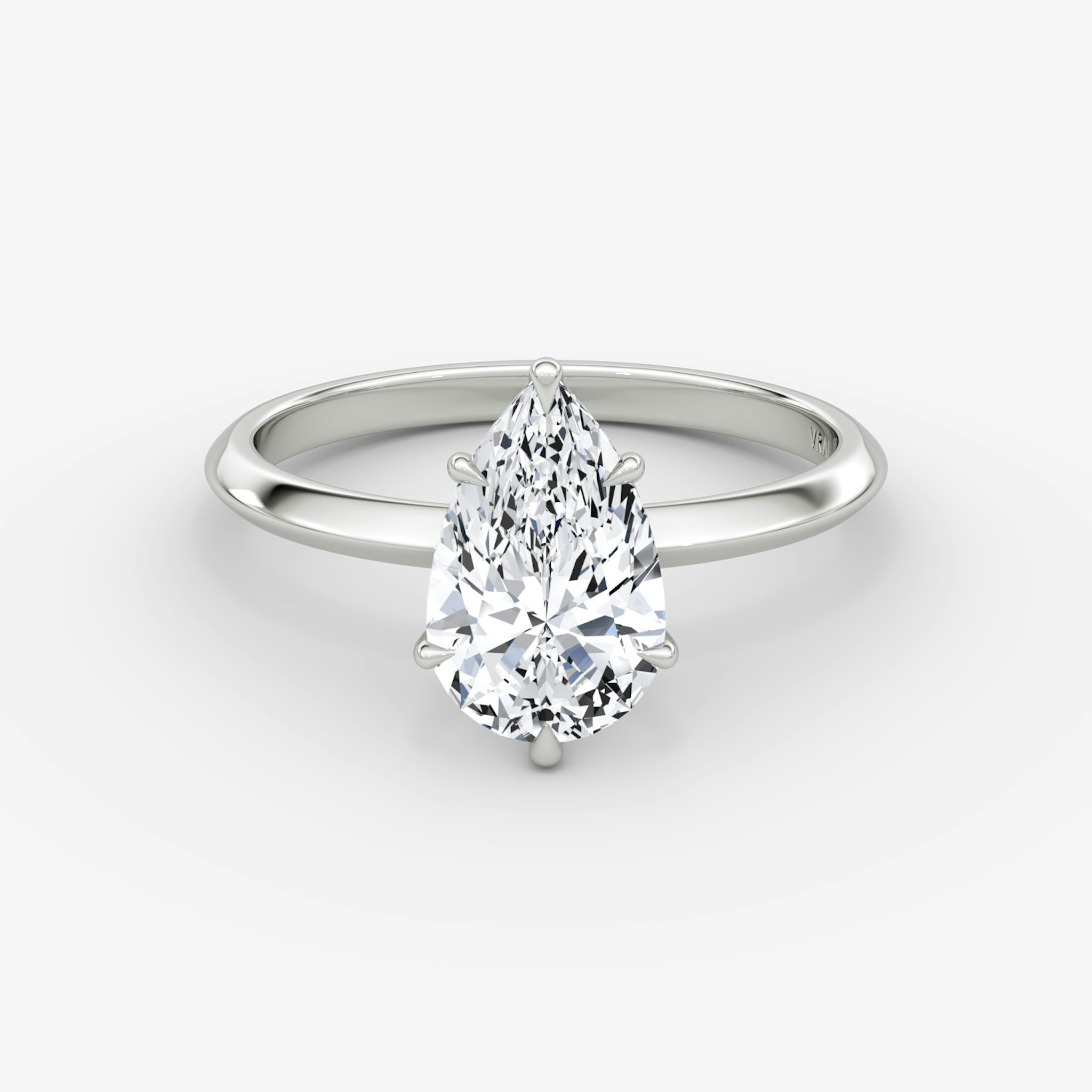 The Knife-Edge | Pear | Platinum | bandAccent: Plain | hiddenHalo: no | diamondOrientation: vertical | caratWeight: other