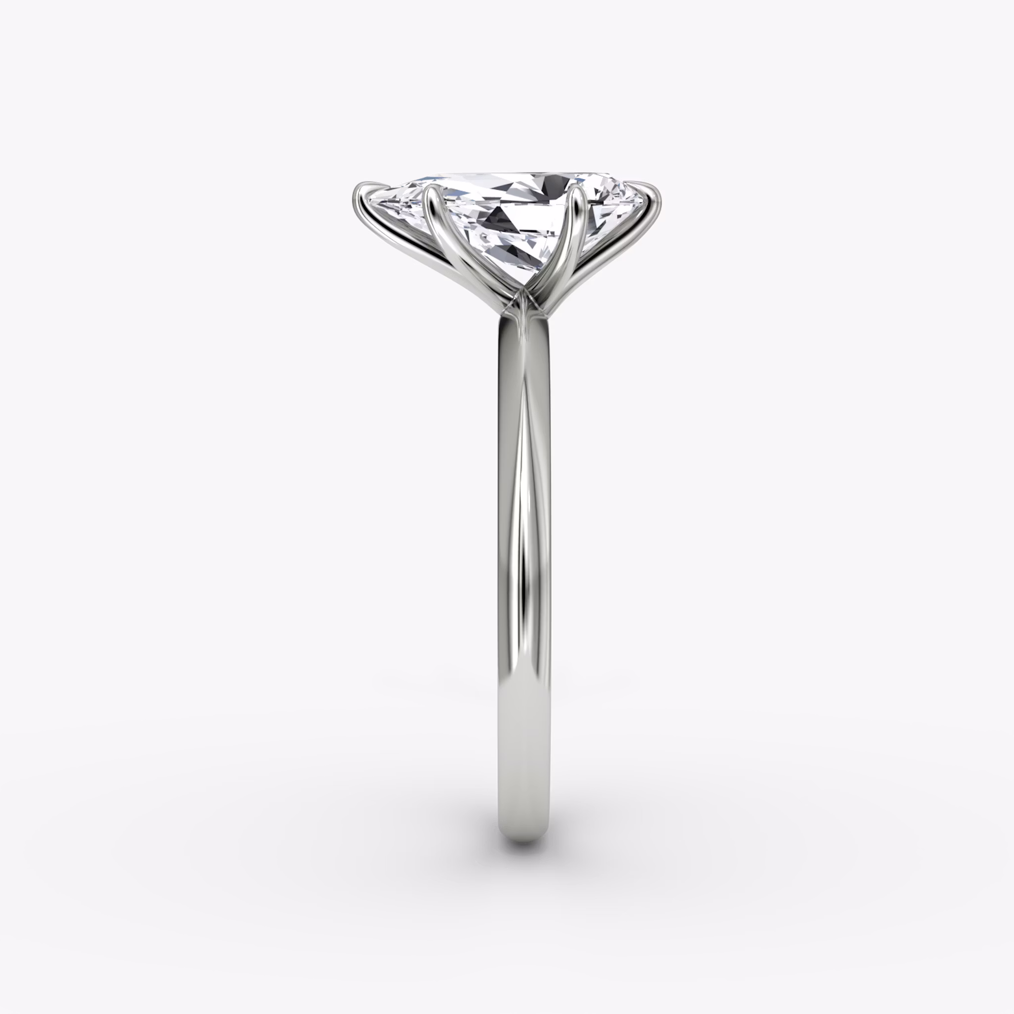 The Knife-Edge | Pear | Platinum | bandAccent: Plain | hiddenHalo: no | diamondOrientation: vertical | caratWeight: other