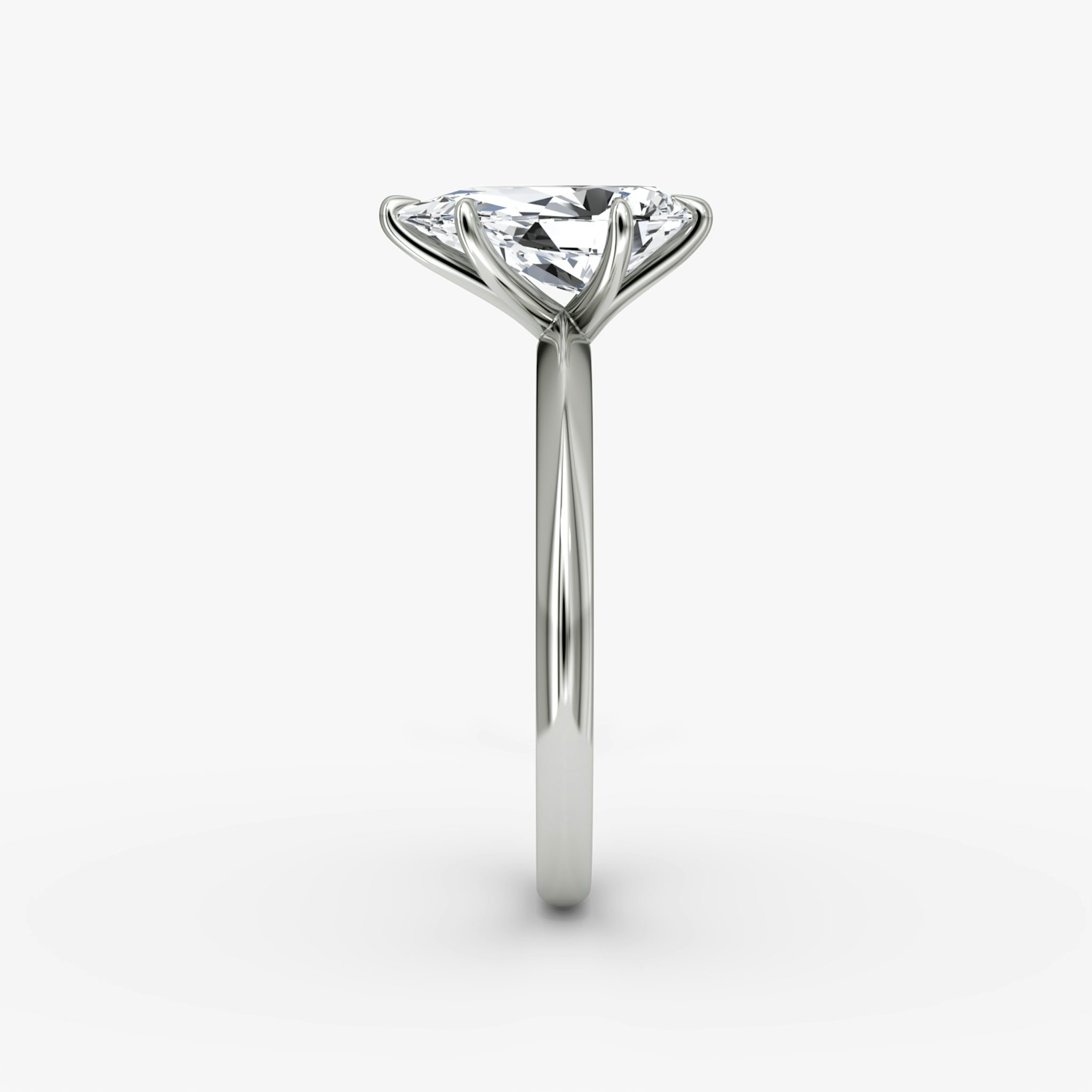 The Knife-Edge | Pear | Platinum | bandAccent: Plain | hiddenHalo: no | diamondOrientation: vertical | caratWeight: other