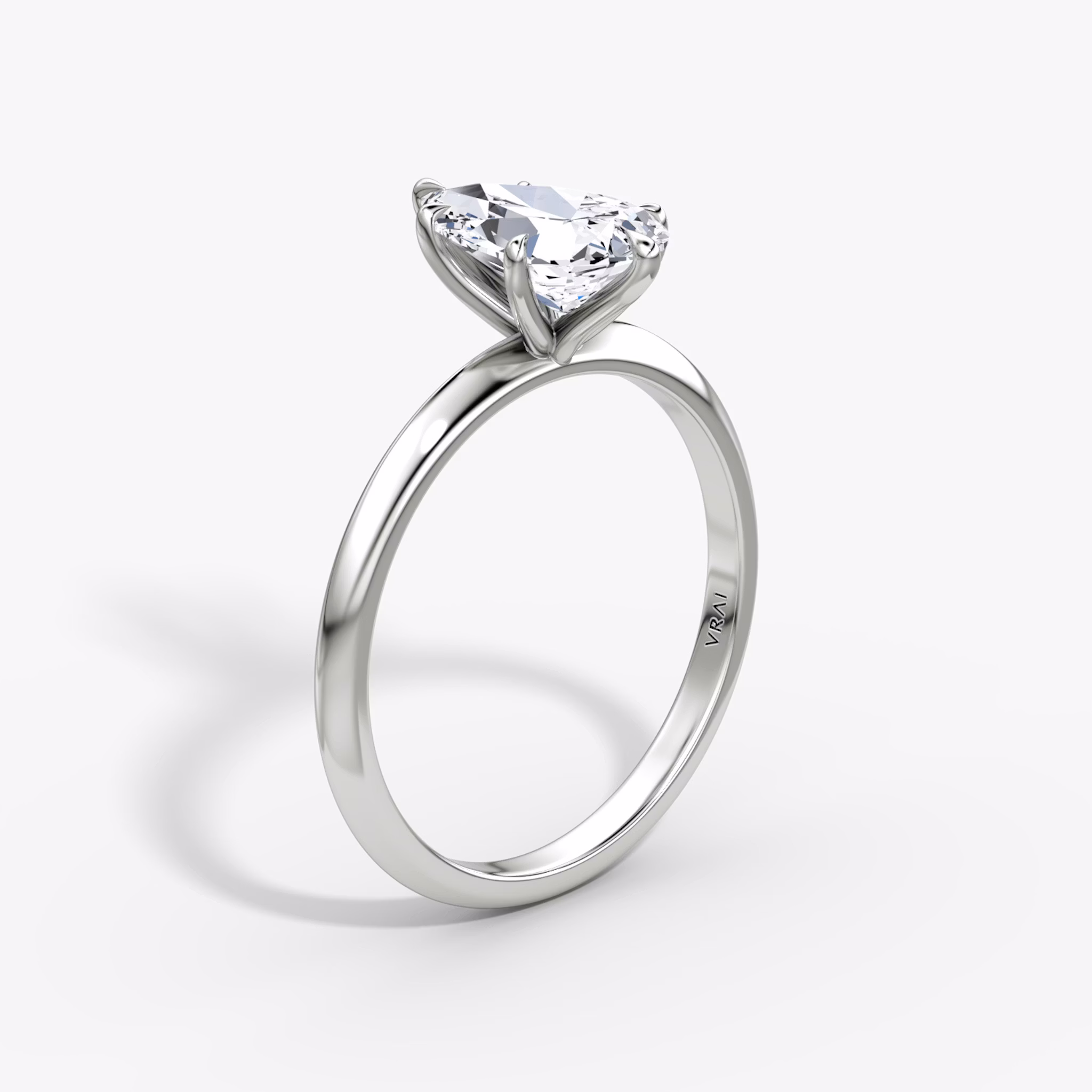 The Knife-Edge | Pear | Platinum | bandAccent: Plain | hiddenHalo: no | diamondOrientation: vertical | caratWeight: other