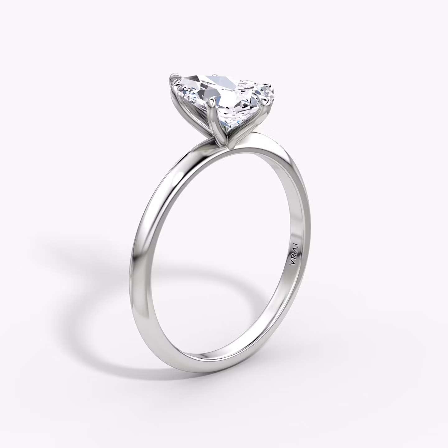 The Knife-Edge | Pear | 18k | White Gold | bandAccent: Plain | hiddenHalo: no | diamondOrientation: vertical | caratWeight: other