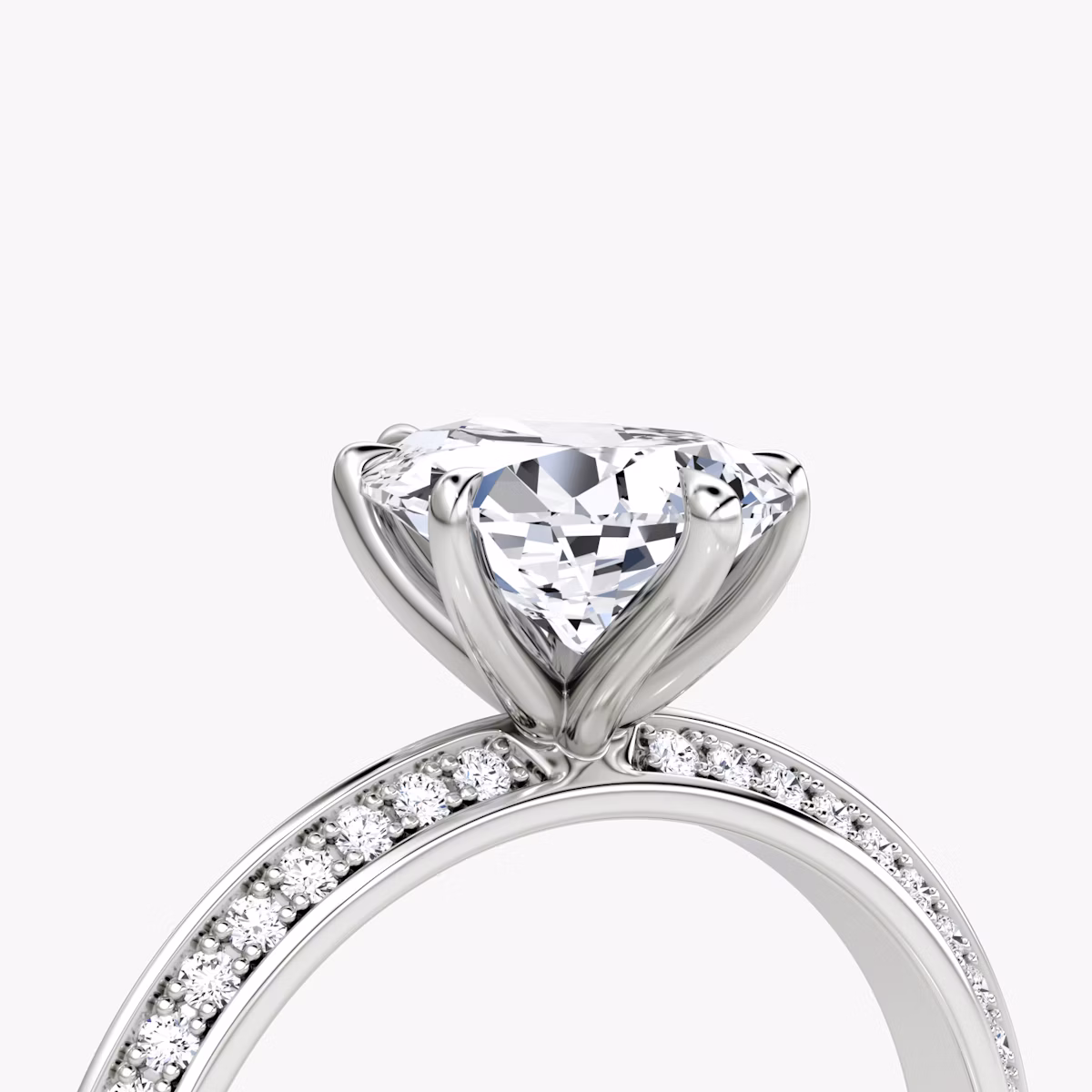 The Knife-Edge | Pear | Platinum | bandAccent: Pavé | hiddenHalo: no | diamondOrientation: vertical | caratWeight: other