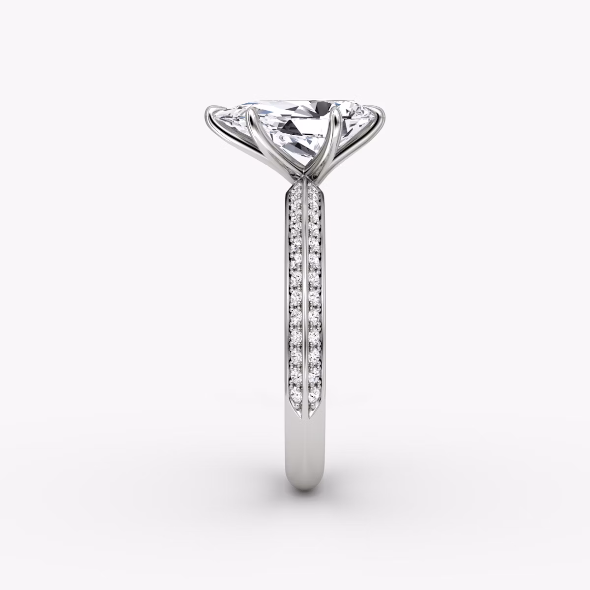The Knife-Edge | Pear | Platinum | bandAccent: Pavé | hiddenHalo: no | diamondOrientation: vertical | caratWeight: other