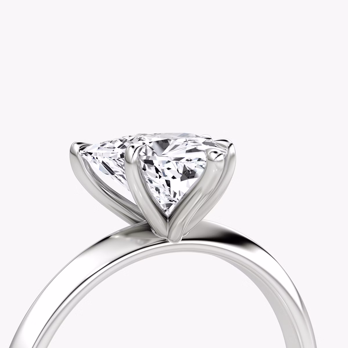 The Knife-Edge | Trillion | Platinum | bandAccent: Plain | hiddenHalo: no | diamondOrientation: vertical | caratWeight: other
