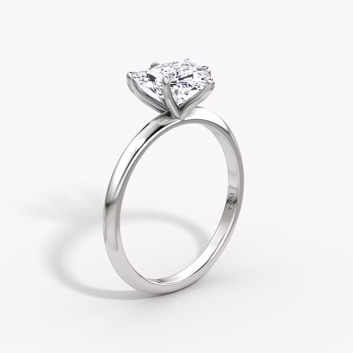 The Knife-Edge | Trillion | Platinum | bandAccent: Plain | hiddenHalo: no | diamondOrientation: vertical | caratWeight: other