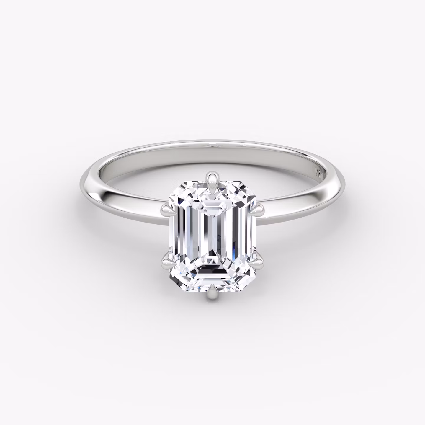 The Knife-Edge | Emerald | Platinum | bandAccent: Plain | hiddenHalo: no | diamondOrientation: vertical | caratWeight: other