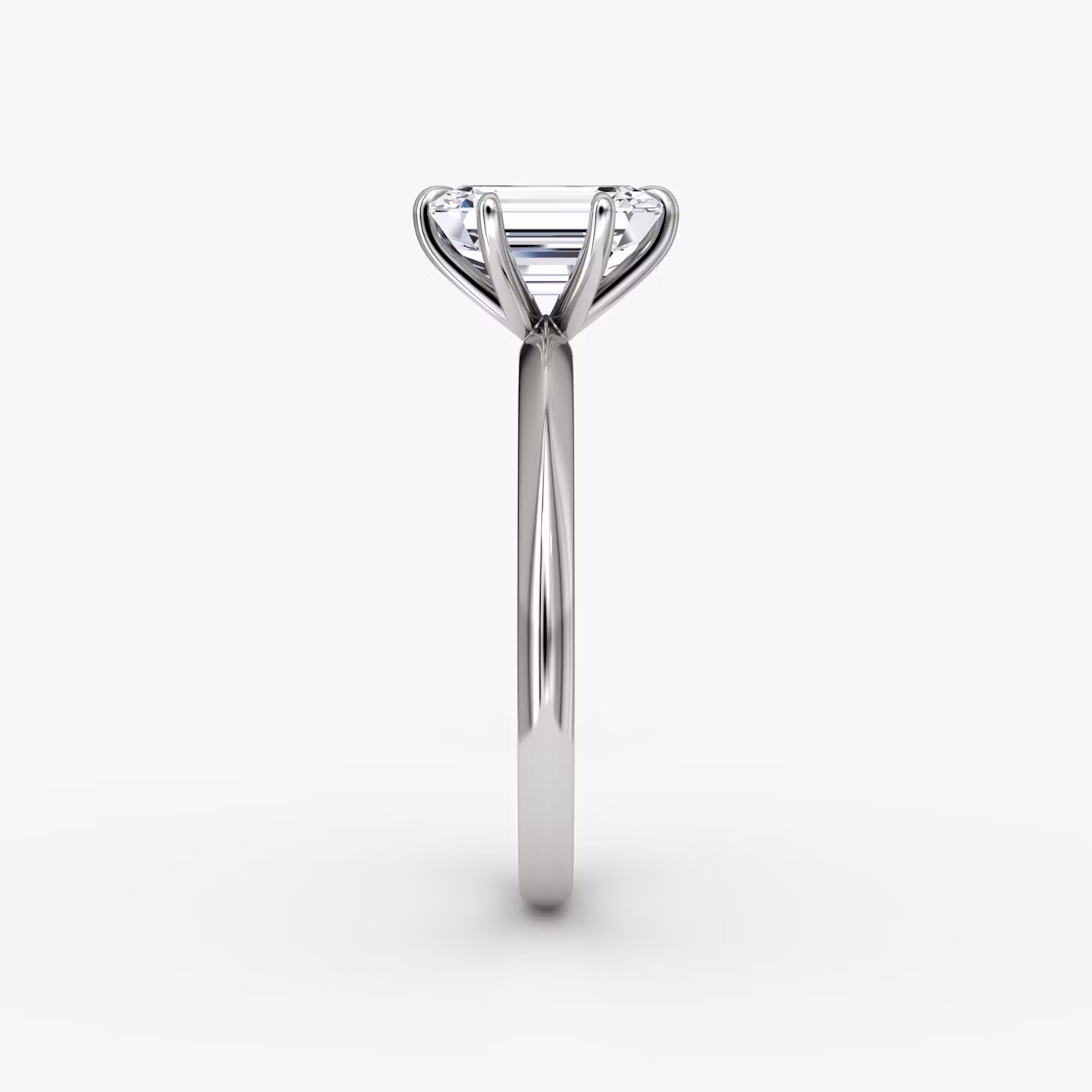 The Knife-Edge | Emerald | Platinum | bandAccent: Plain | hiddenHalo: no | diamondOrientation: vertical | caratWeight: other