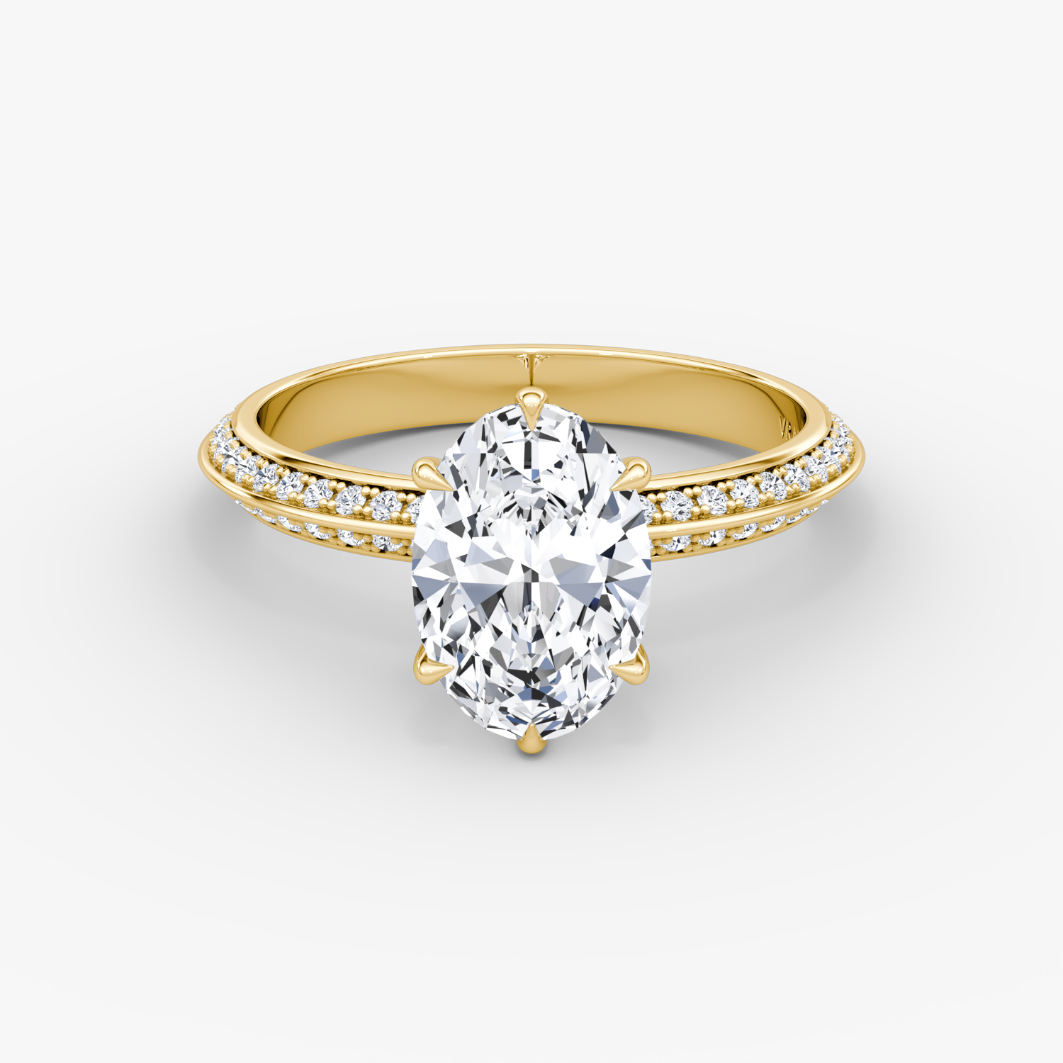The Knife-Edge Oval Engagement Ring in Yellow Gold with Pavé Band