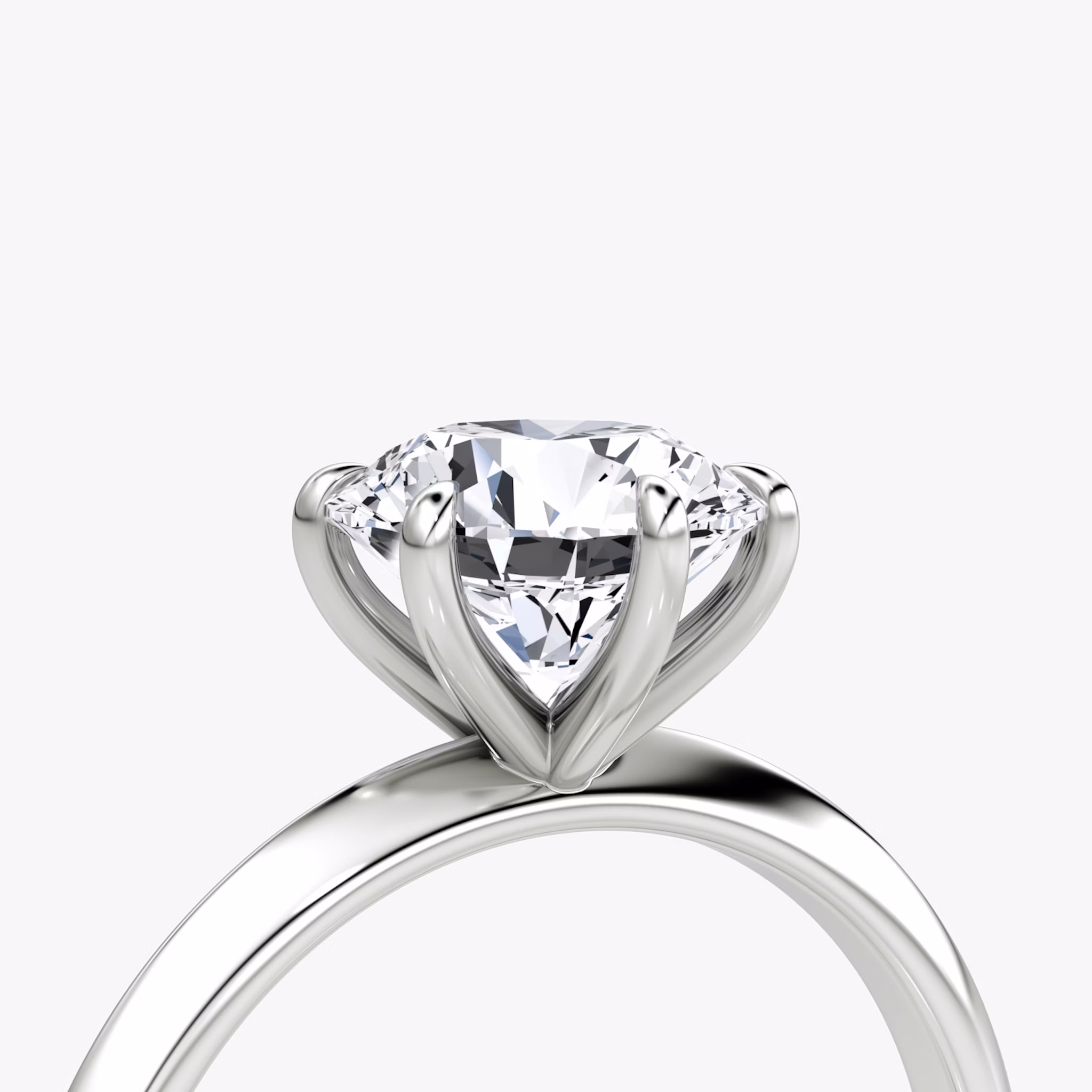 The Knife-Edge | Round Brilliant | Platinum | bandAccent: Plain | caratWeight: 1.0ct | hiddenHalo: no | diamondOrientation: vertical