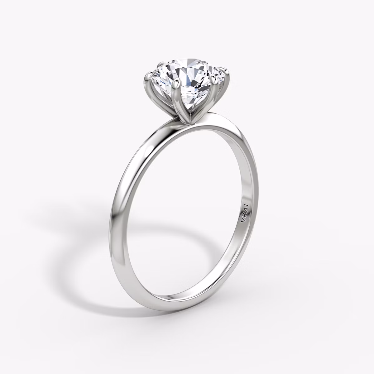 The Knife-Edge | Round Brilliant | Platinum | bandAccent: Plain | caratWeight: 1.0ct | hiddenHalo: no | diamondOrientation: vertical
