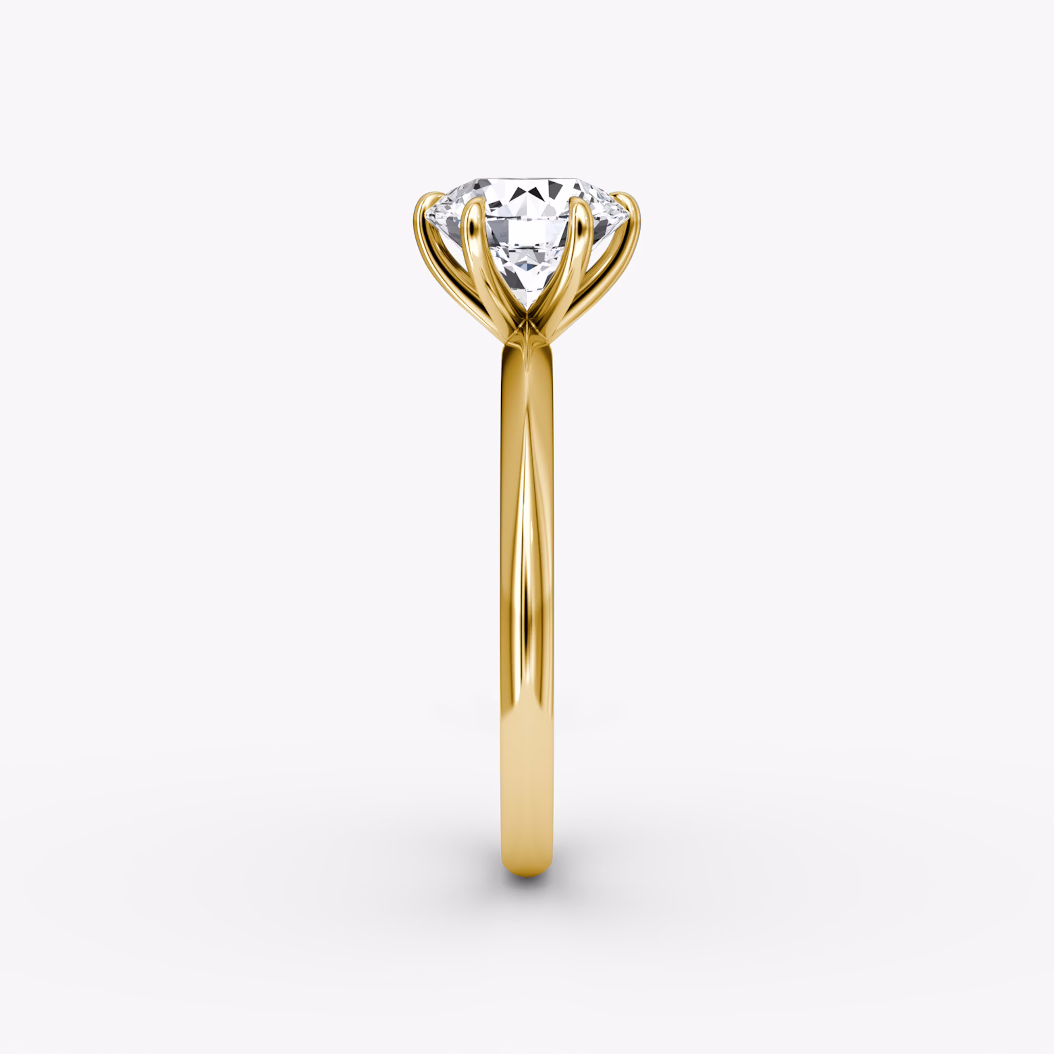 The Knife-Edge | Round Brilliant | 18k | Yellow Gold | bandAccent: Plain | caratWeight: other | hiddenHalo: no | diamondOrientation: vertical