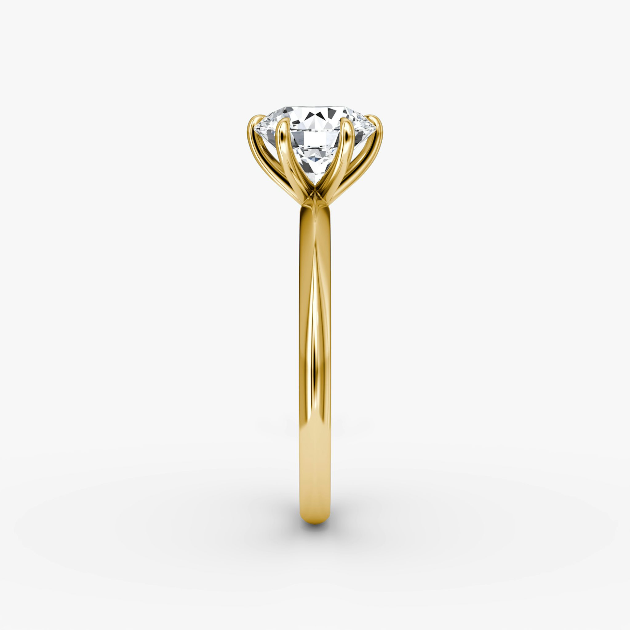The Knife-Edge | Round Brilliant | 18k | Yellow Gold | bandAccent: Plain | caratWeight: other | hiddenHalo: no | diamondOrientation: vertical