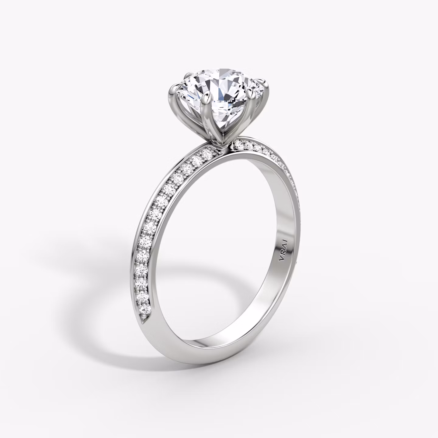 The Knife-Edge | Round Brilliant | Platinum | bandAccent: Pavé | caratWeight: 1.5ct | hiddenHalo: no | diamondOrientation: vertical