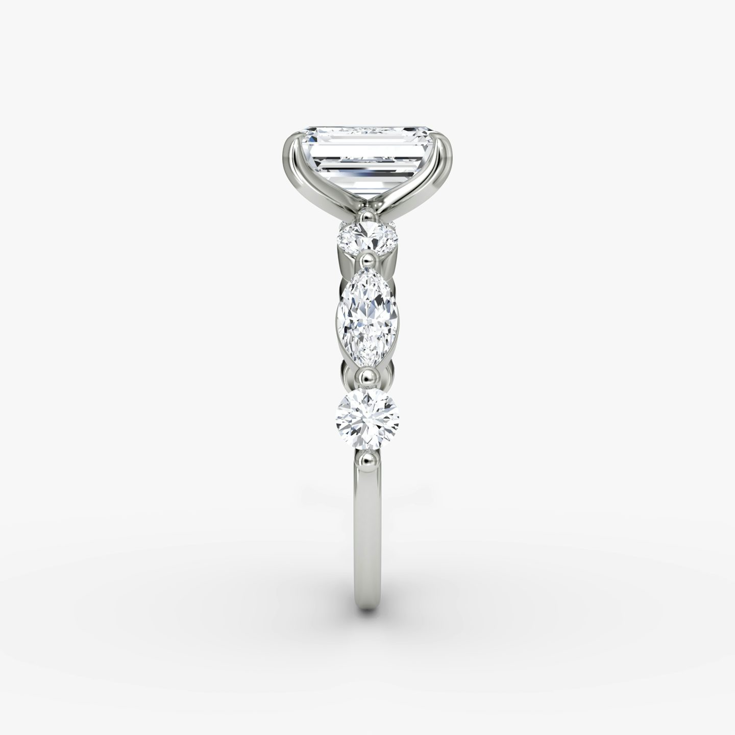 The Mixed Shape Single Shared Prong | Emerald | Platinum | bandAccent: Plain | diamondOrientation: vertical | caratWeight: other