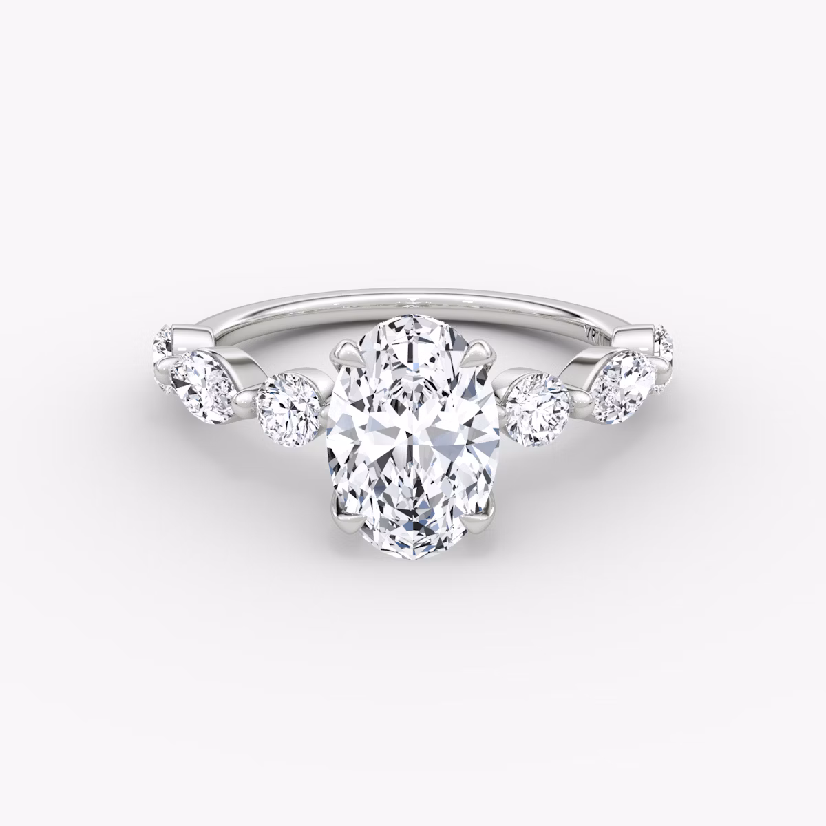 mixed shape single shared prong engagement ring oval white gold