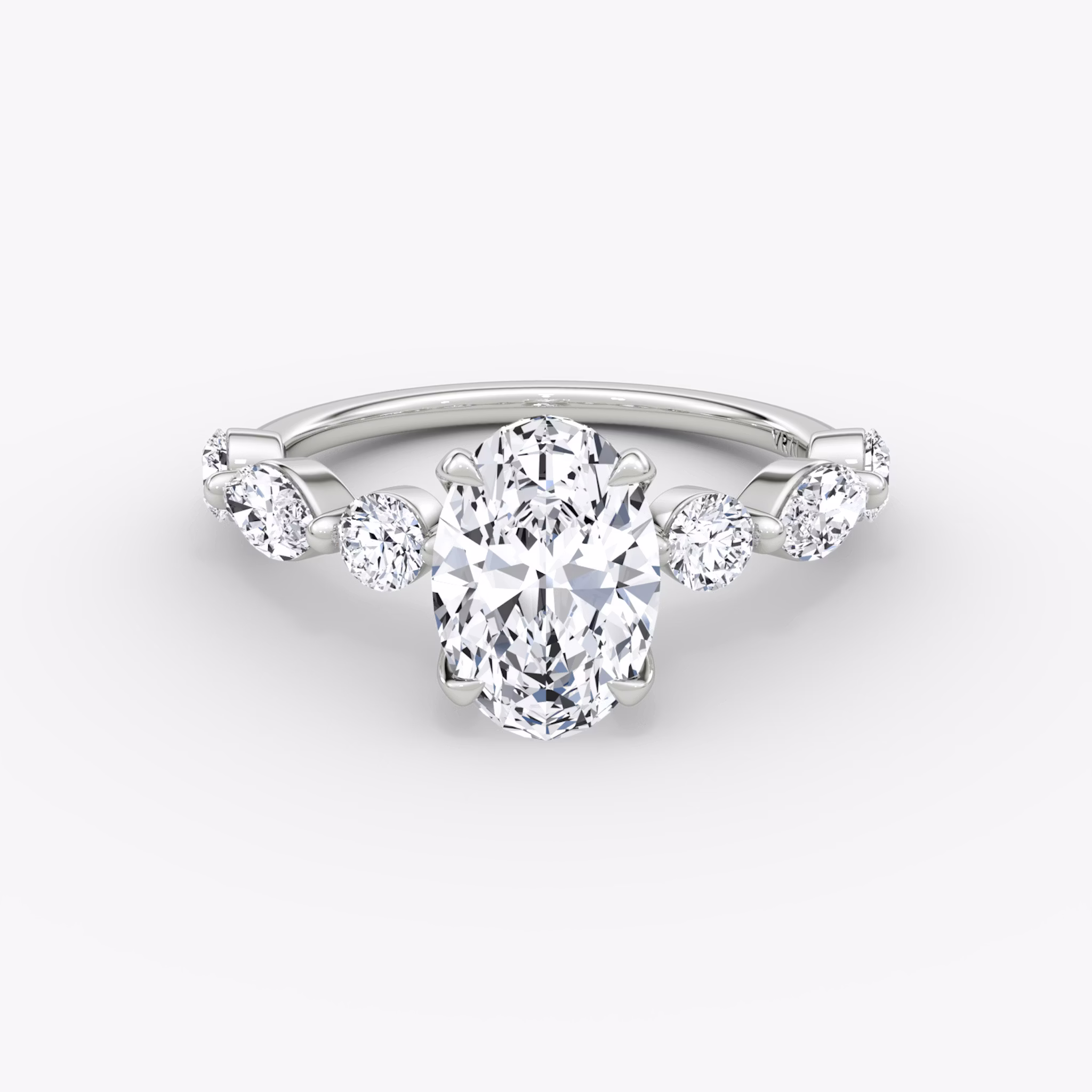 mixed shape single shared prong engagement ring oval white gold