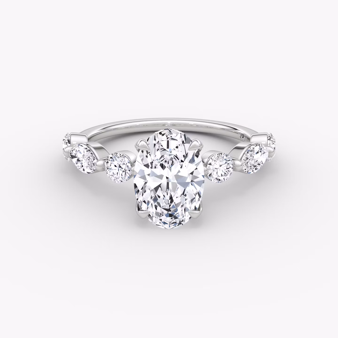 mixed shape single shared prong engagement ring oval white gold