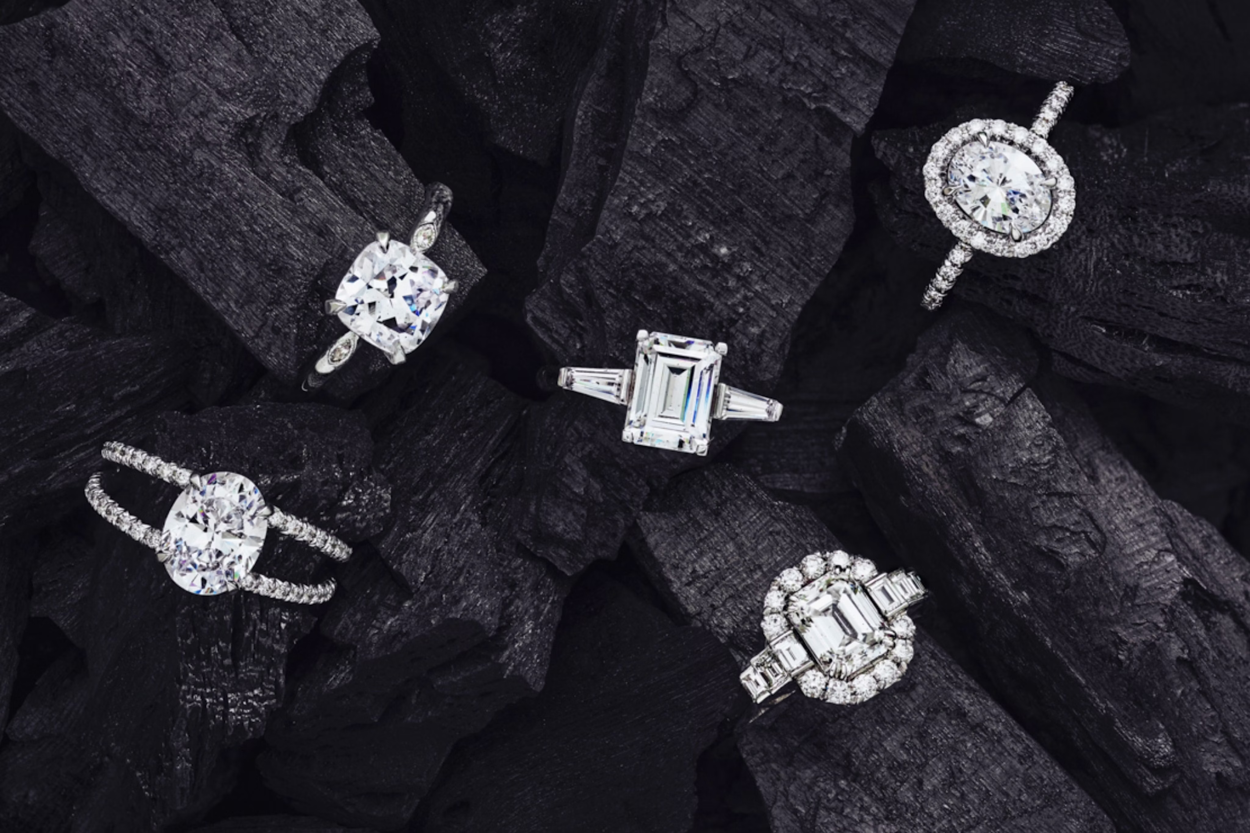 Five different engagement rings including halo, double band, emerald cut and oval cut