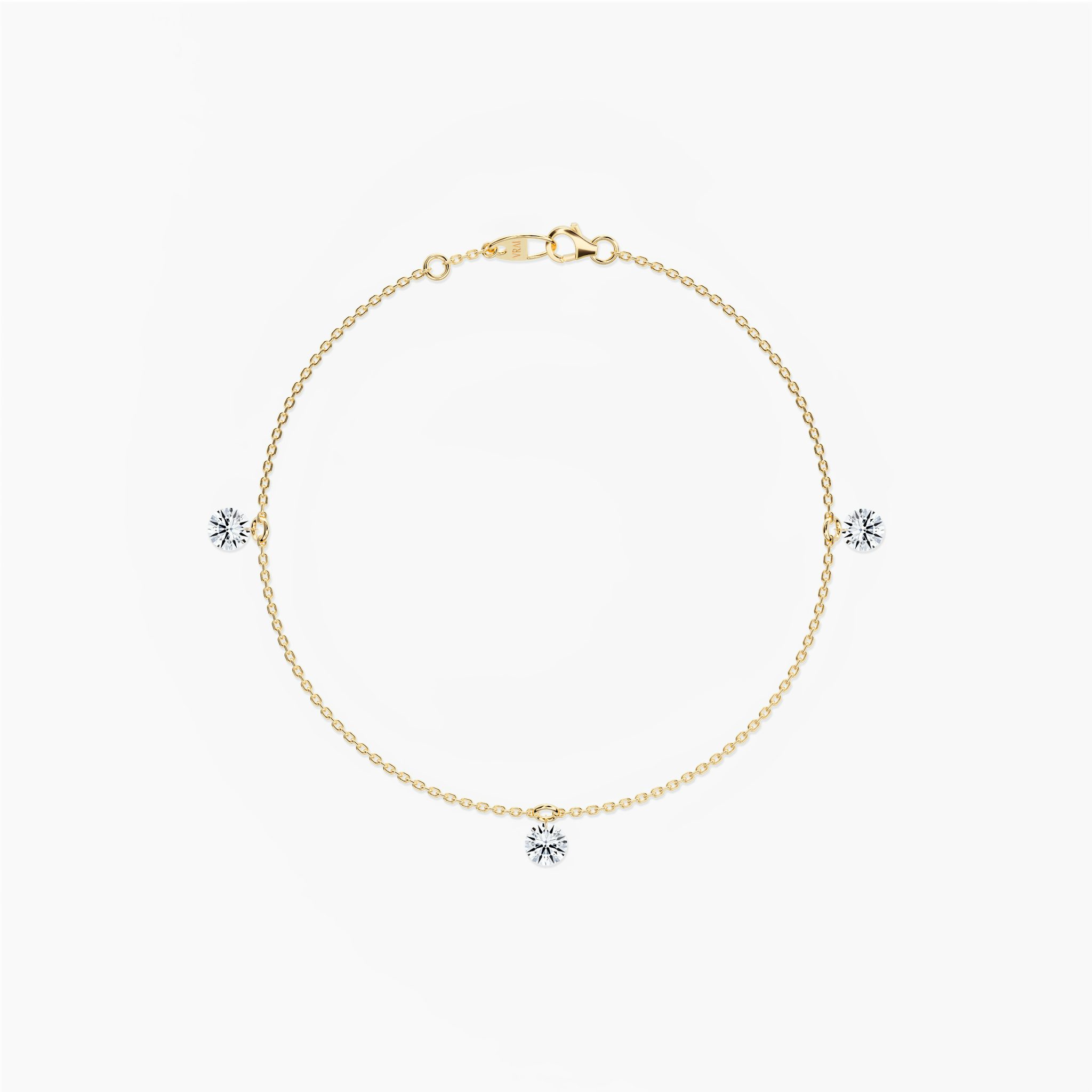 Floating Station Bracelet | Round Brilliant | 14k | Yellow Gold | diamondCount: 3 | diamondSize: original | chainLength: 7