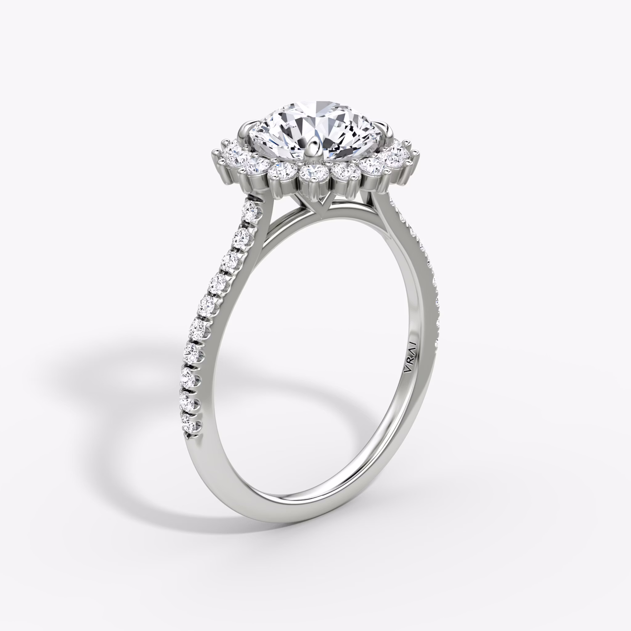The Floral Cathedral | Round Brilliant | Platinum | bandAccent: Pavé | caratWeight: other | diamondOrientation: vertical