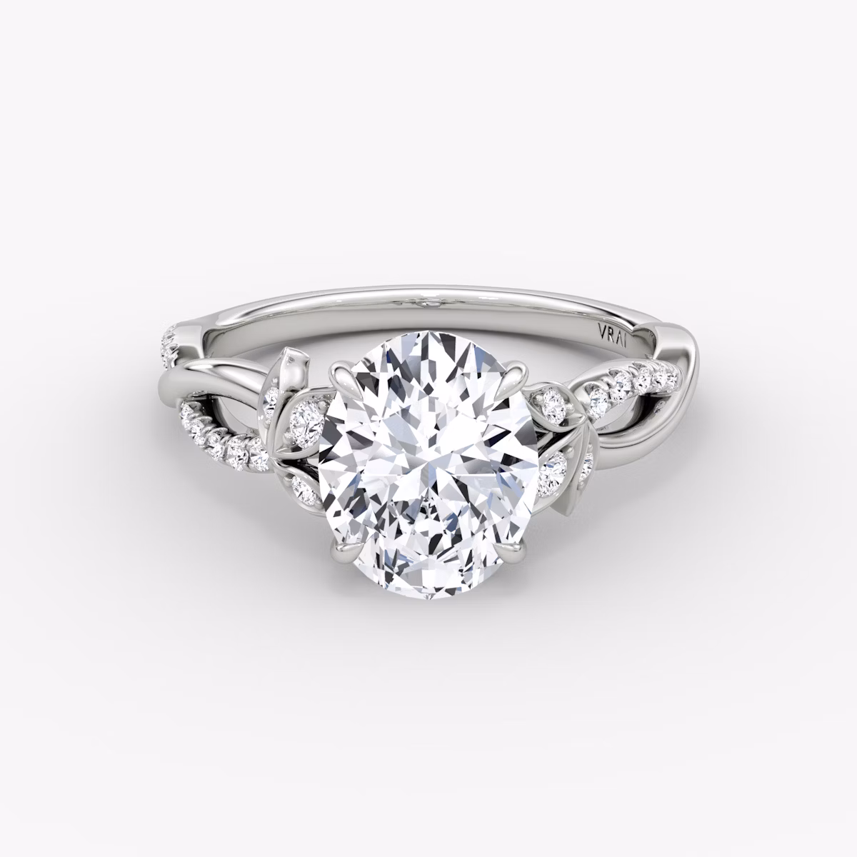 The Twisted Floral | Oval | 18k | White Gold | bandAccent: Pavé | diamondOrientation: vertical | caratWeight: other