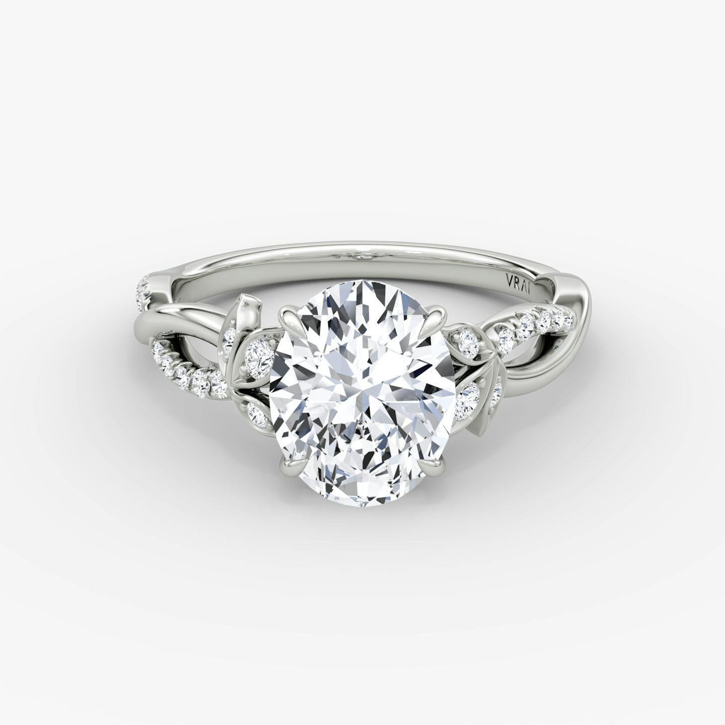 The Twisted Floral | Oval | Platinum | bandAccent: Pavé | diamondOrientation: vertical | caratWeight: other