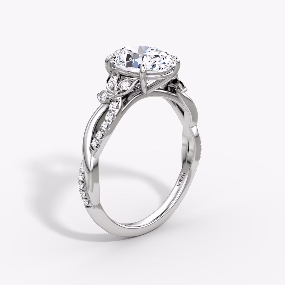 The Twisted Floral | Oval | 18k | White Gold | bandAccent: Pavé | diamondOrientation: vertical | caratWeight: other