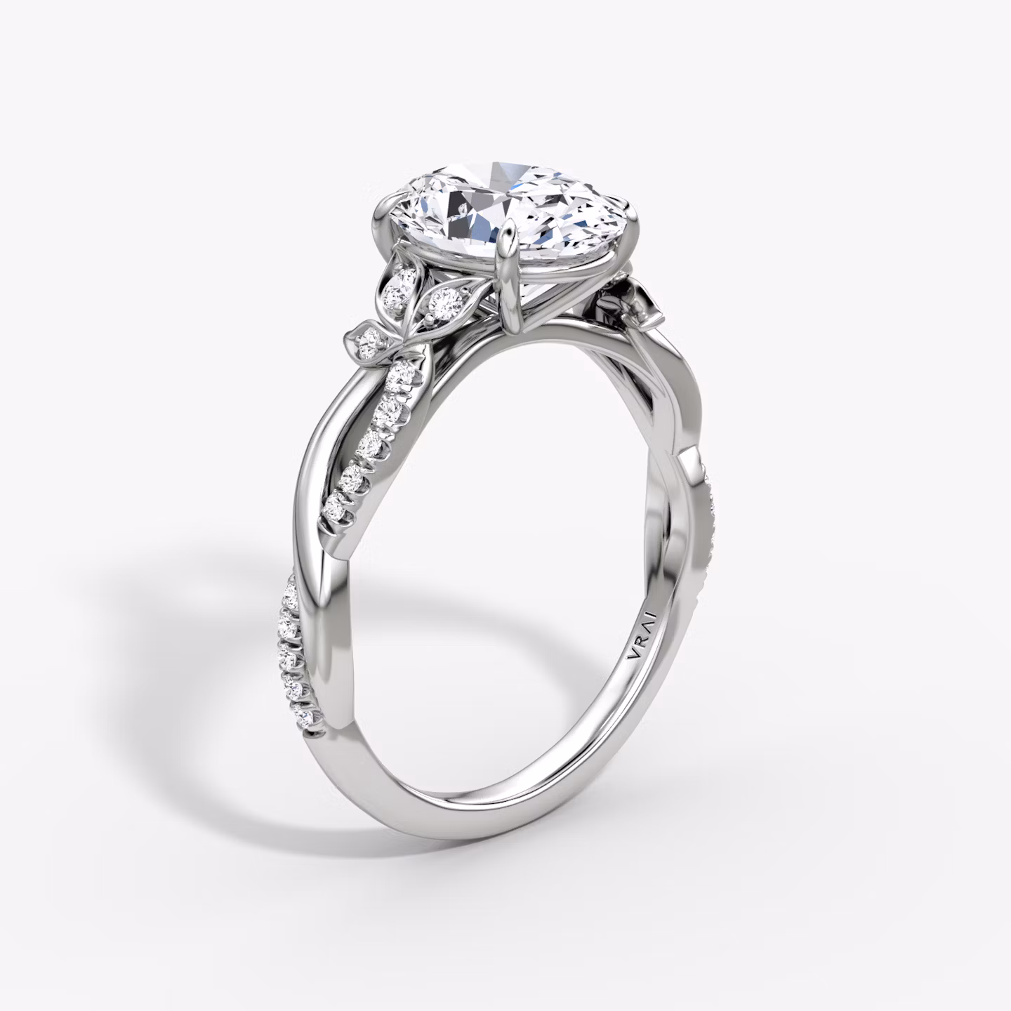 The Twisted Floral | Oval | Platinum | bandAccent: Pavé | diamondOrientation: vertical | caratWeight: other