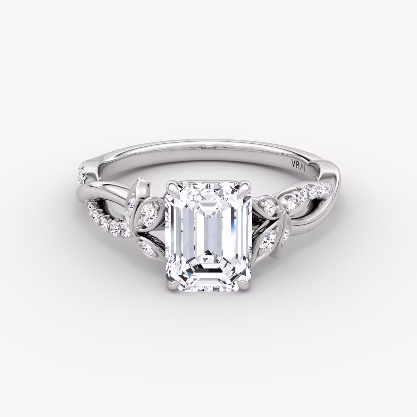 The Twisted Floral | Emerald | 18k | White Gold | bandAccent: Pavé | diamondOrientation: vertical | caratWeight: other