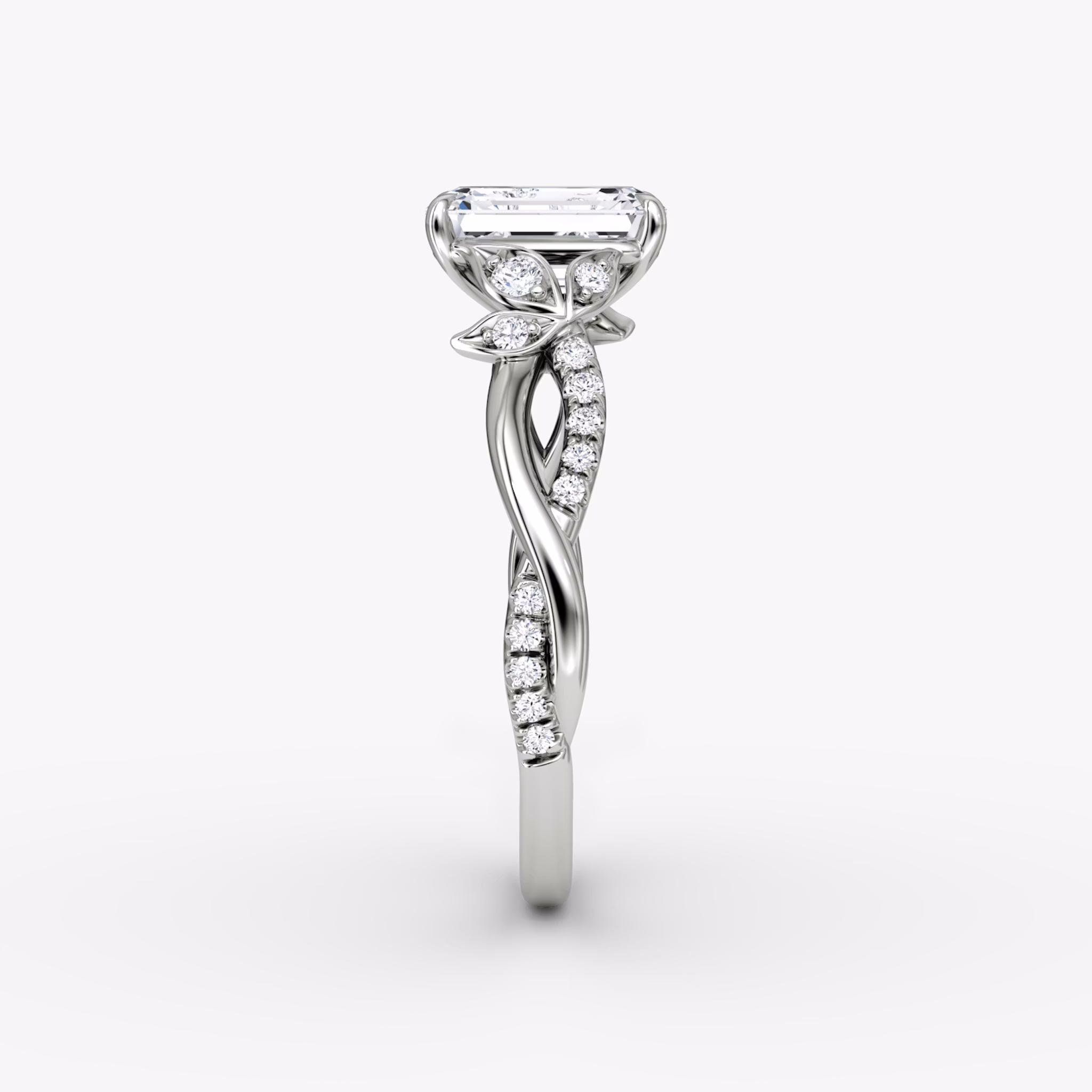 The Twisted Floral | Emerald | Platinum | bandAccent: Pavé | diamondOrientation: vertical | caratWeight: other