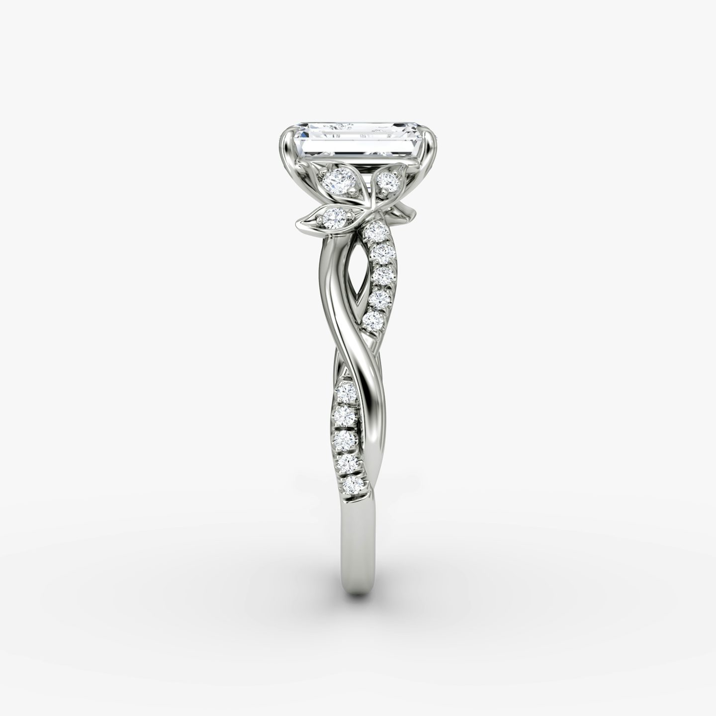 The Twisted Floral | Emerald | 18k | White Gold | bandAccent: Pavé | diamondOrientation: vertical | caratWeight: other
