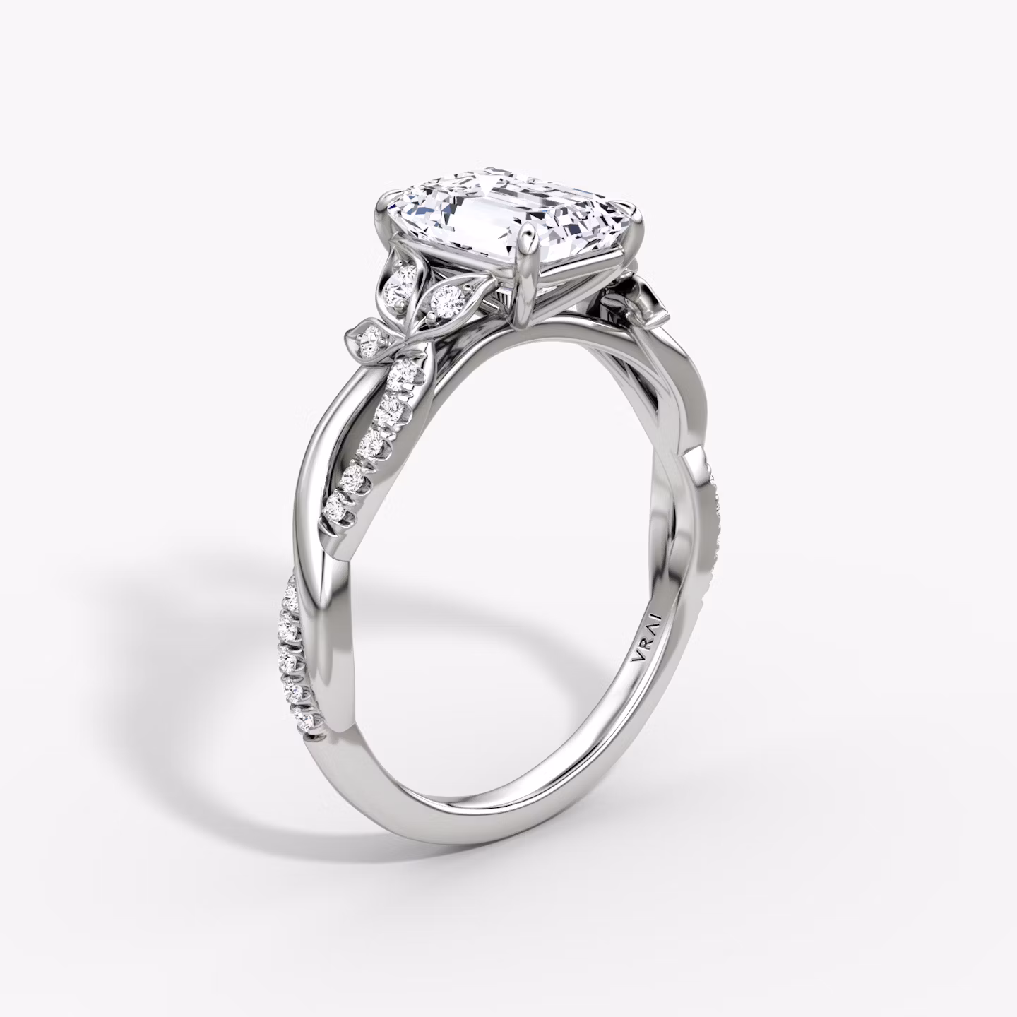 The Twisted Floral | Emerald | 18k | White Gold | bandAccent: Pavé | diamondOrientation: vertical | caratWeight: other
