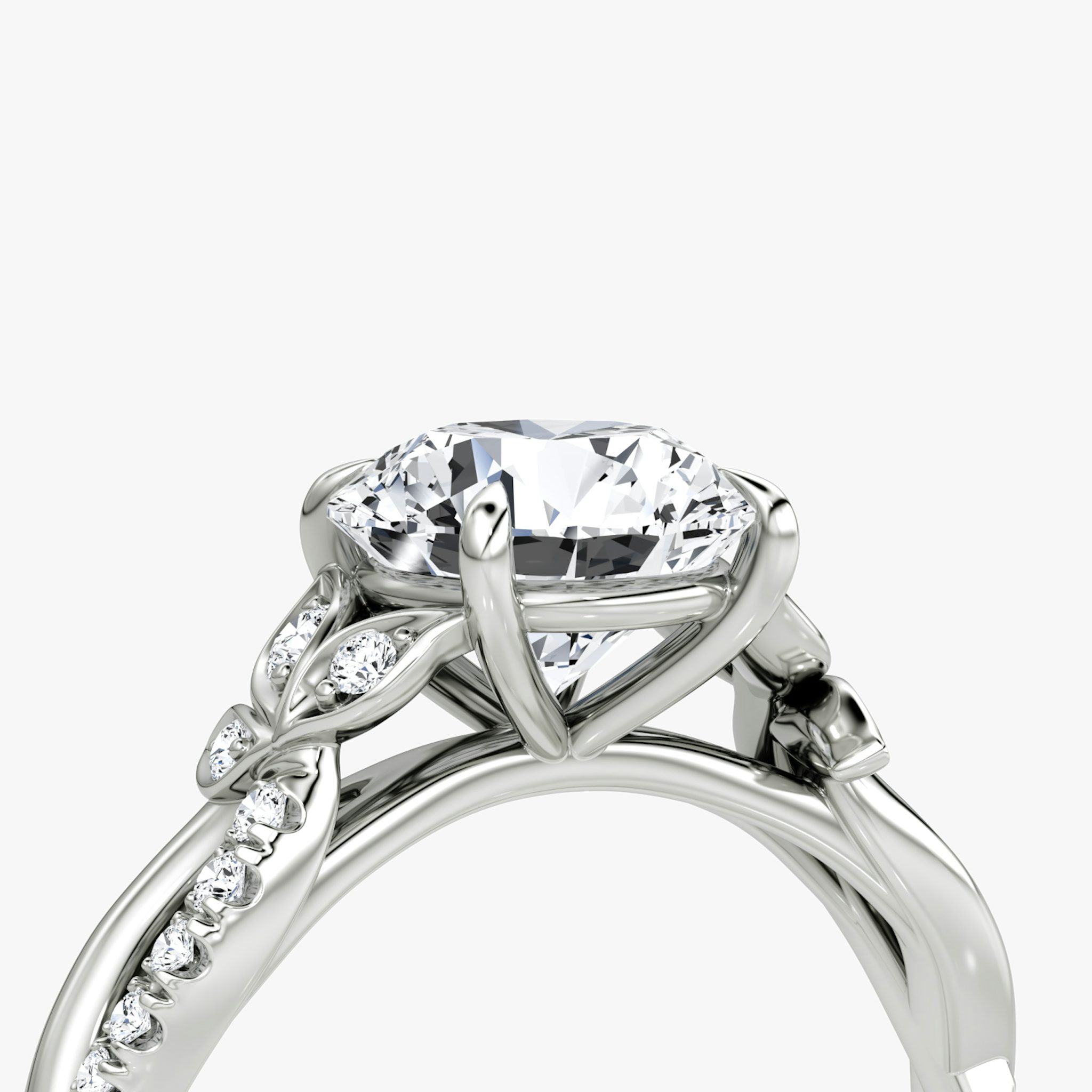 The Twisted Floral | Round Brilliant | Platinum | bandAccent: Pavé | caratWeight: 1.0ct | diamondOrientation: vertical