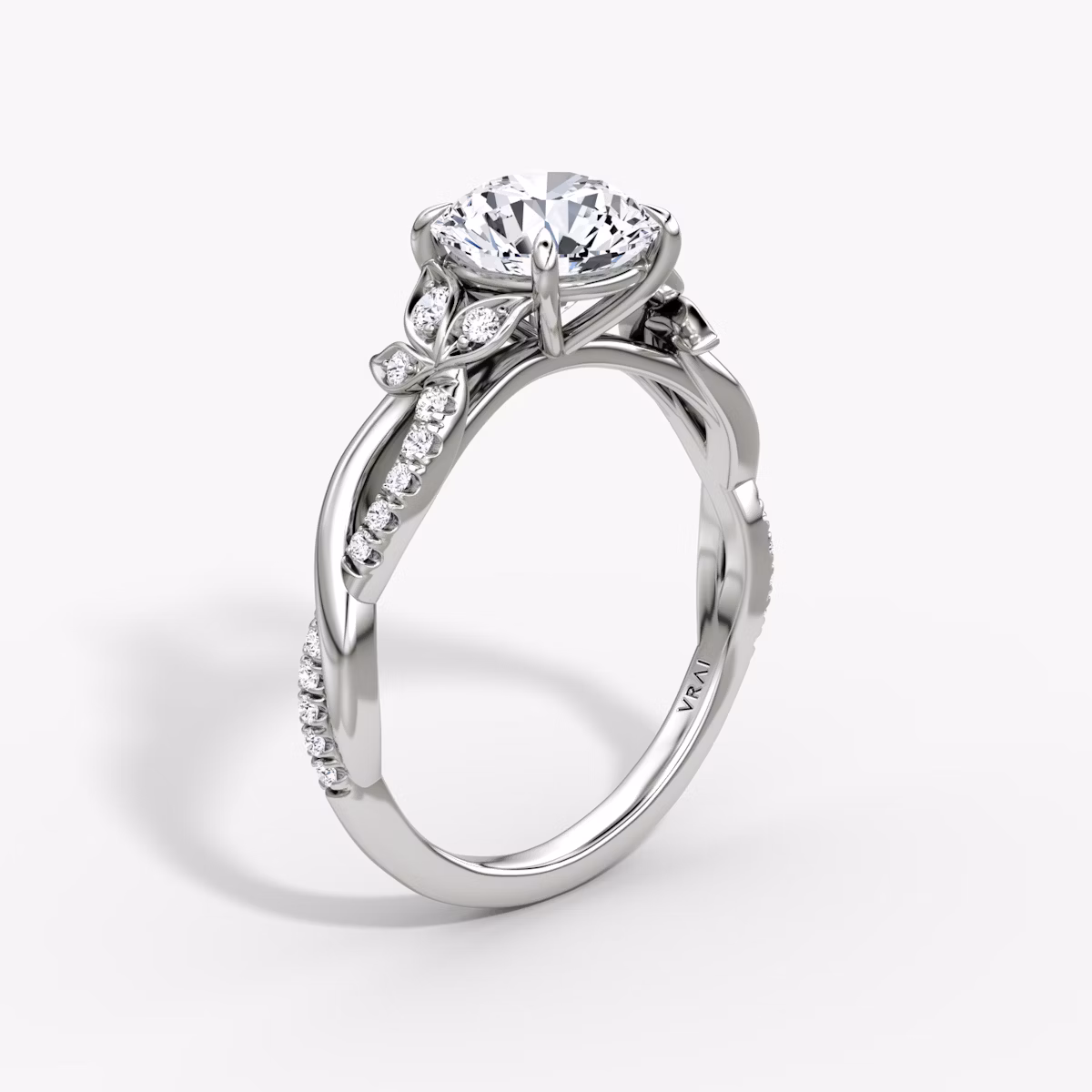 The Twisted Floral | Round Brilliant | Platinum | bandAccent: Pavé | caratWeight: 2.0ct | diamondOrientation: vertical