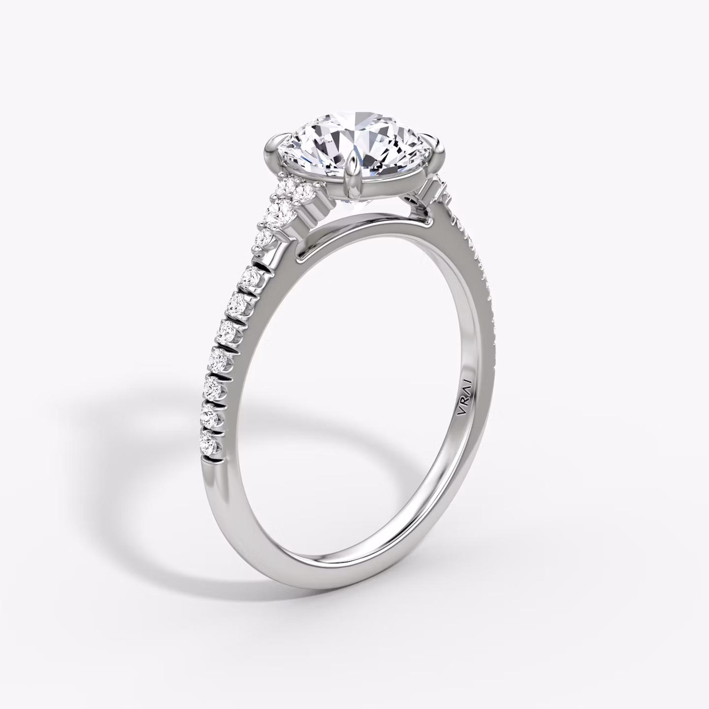 The Side Cluster Cathedral | Round Brilliant | Platinum | bandAccent: Pavé | caratWeight: 1.5ct | diamondOrientation: vertical