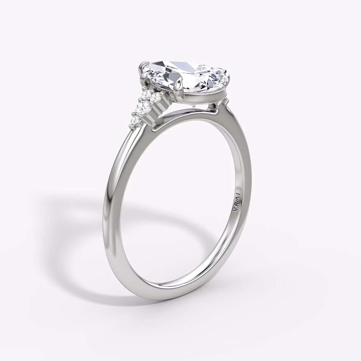 The Side Cluster Cathedral | Pear | Platinum | bandAccent: Plain | diamondOrientation: vertical | caratWeight: other