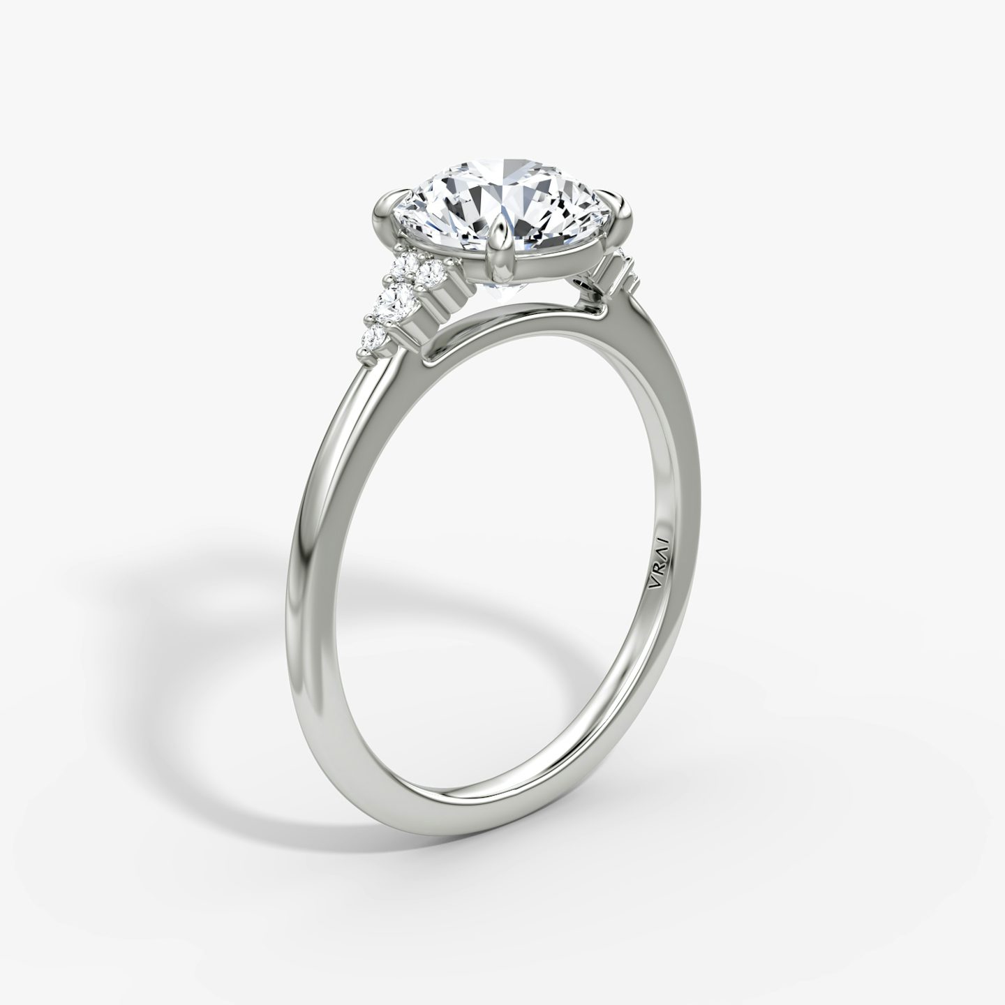 The Side Cluster Cathedral | Round Brilliant | Platinum | bandAccent: Plain | caratWeight: other | diamondOrientation: vertical
